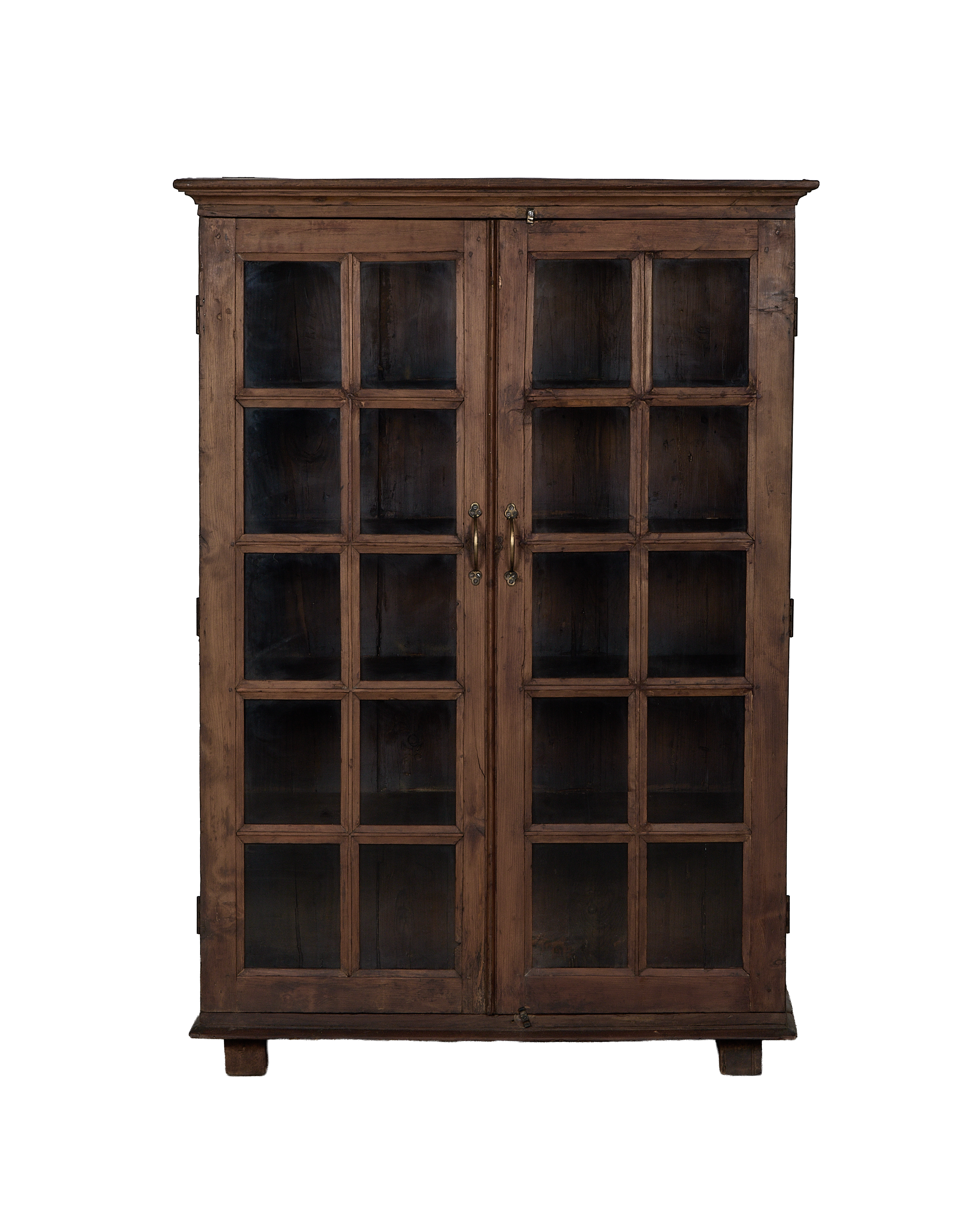 Vintage Indian oak wood cabinet, natural finish, featuring glass-paneled double doors with brass pulls.