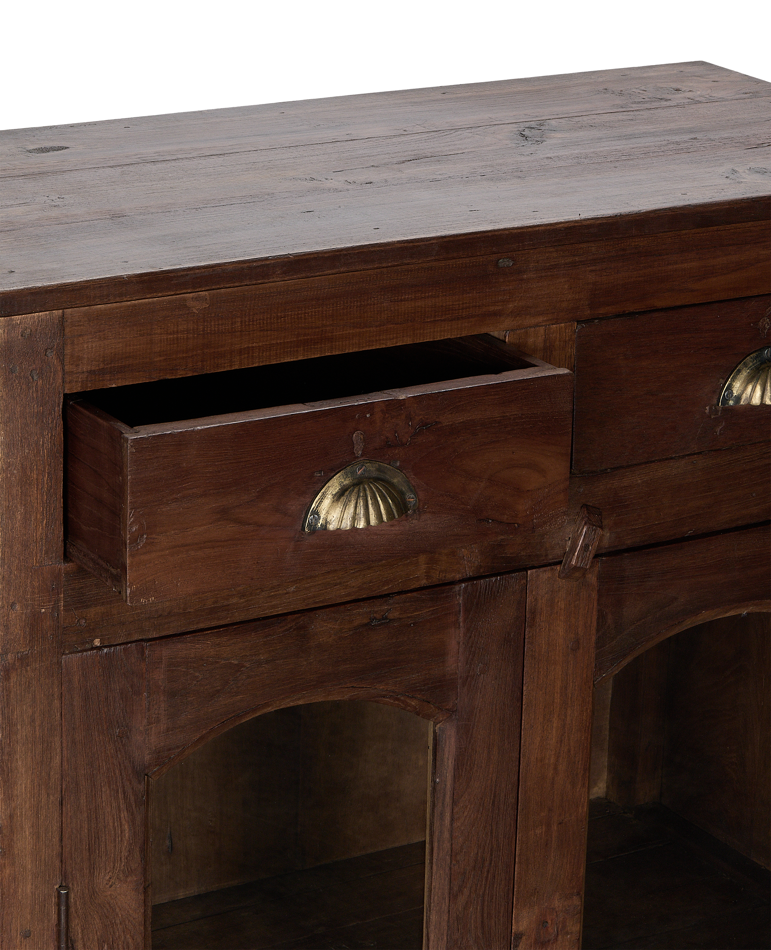 Vintage Indian oak wood cabinet, open drawer with brass handle, aged natural finish.