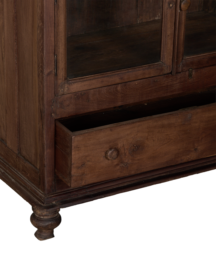 Vintage Indian oak wood cabinet, open drawer revealing interior and turned feet.