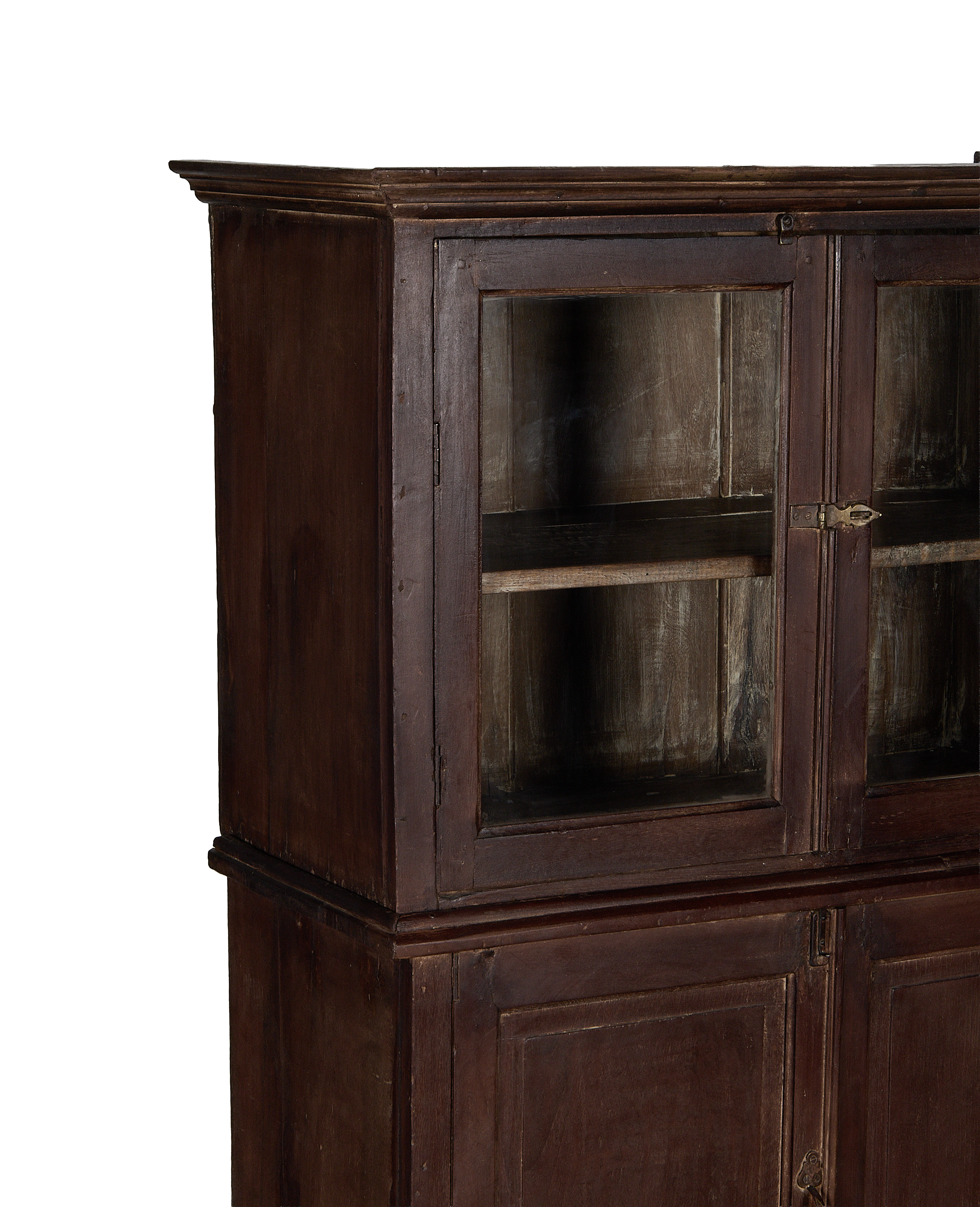 Vintage Indian stained oak wood cabinet featuring glass-fronted upper doors and bottom paneling.