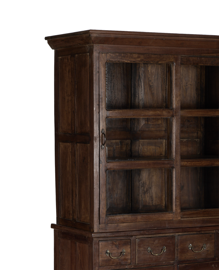Vintage Indian oak wood display cabinet, glass door detail, and brass drawer pull.