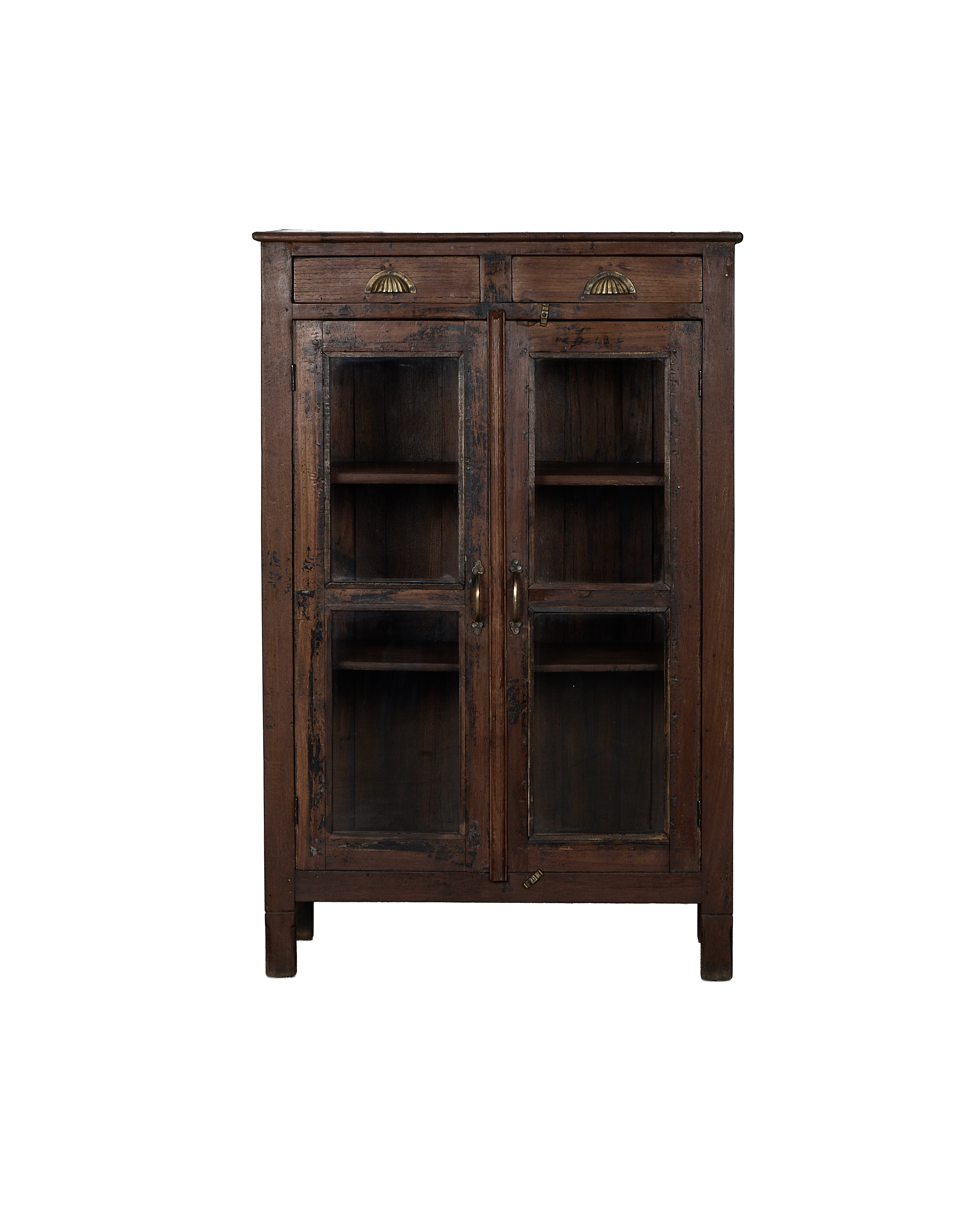 Vintage Indian oak cabinet, distressed dark wood, two glass doors, two drawers with brass pulls.