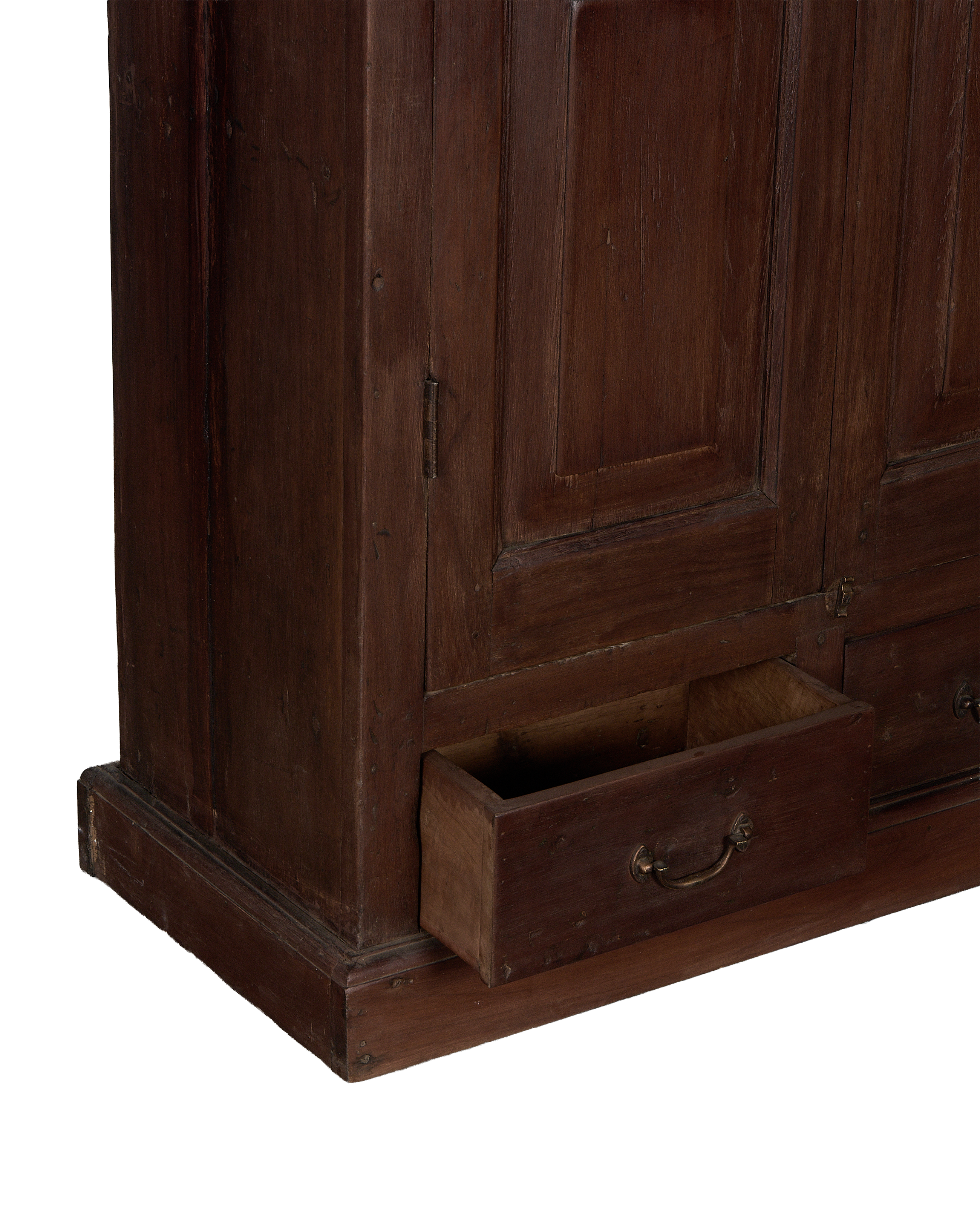 Vintage Indian oak cabinet featuring an open drawer with brass pull, showcasing natural wood grain.