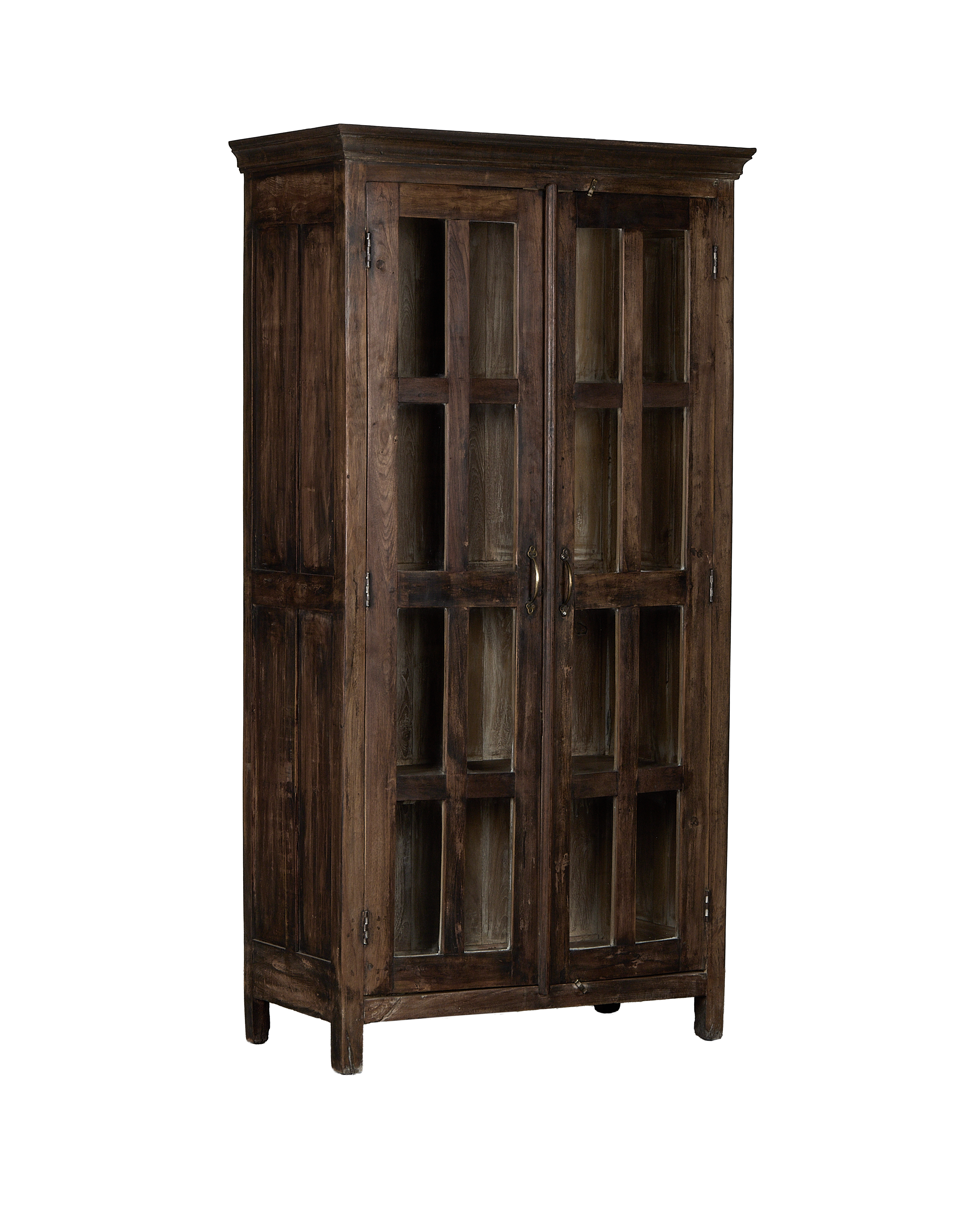 Vintage Indian oak wood cabinet, frontal view, showcasing two glass-paneled doors with brass handles.