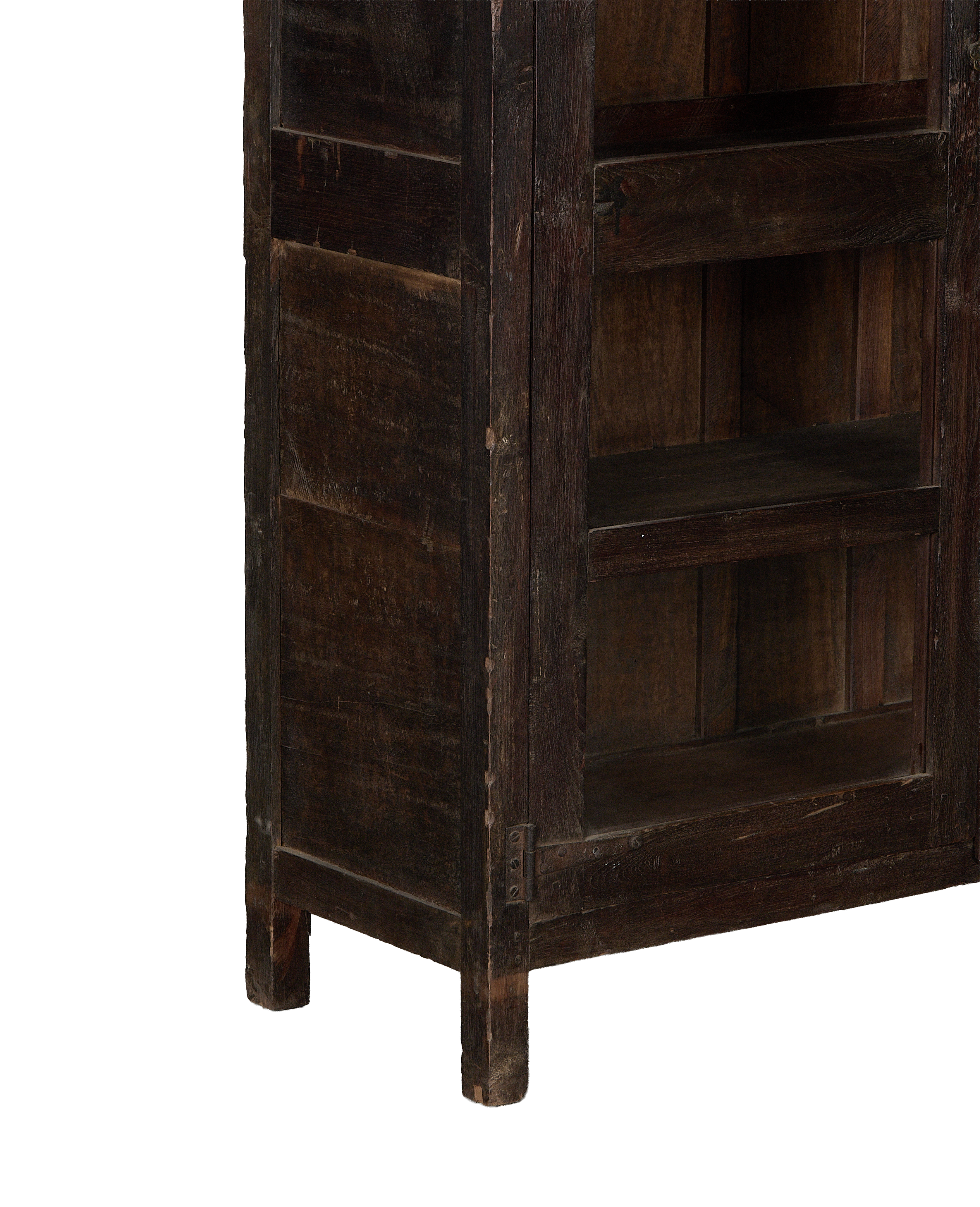 Vintage Indian oak cabinet featuring distressed stained wood, metal hinge details, and lower carved leg.