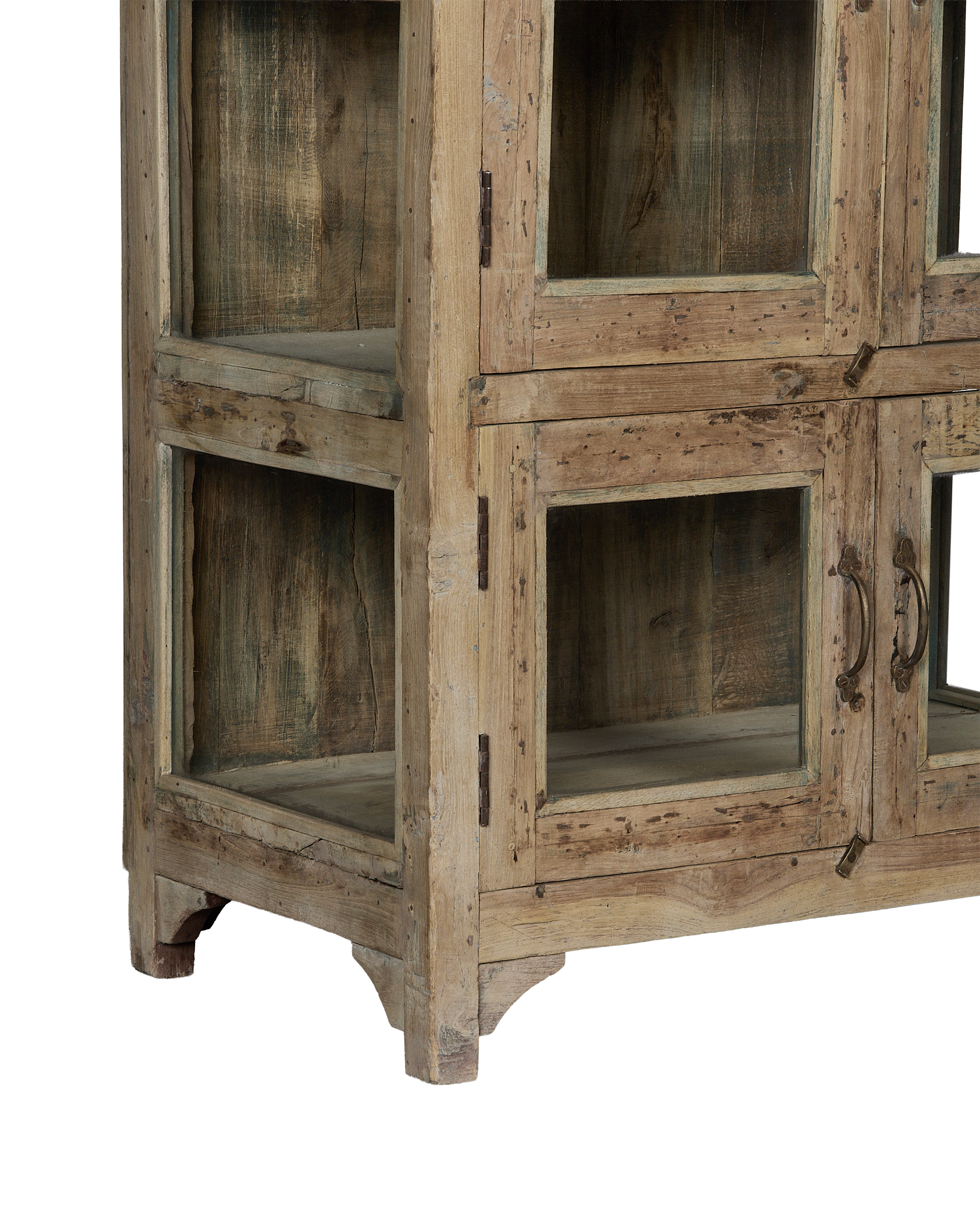 Vintage bleached oak cabinet from India, showing rustic panels, glass doors, and distressed wooden supports.
