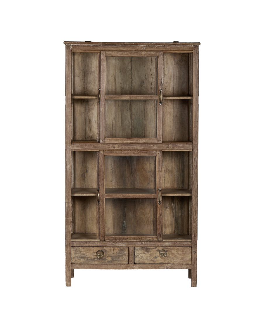 Vintage natural oak cabinet from India, showing multiple glass-front doors, drawers, and distressed condition.