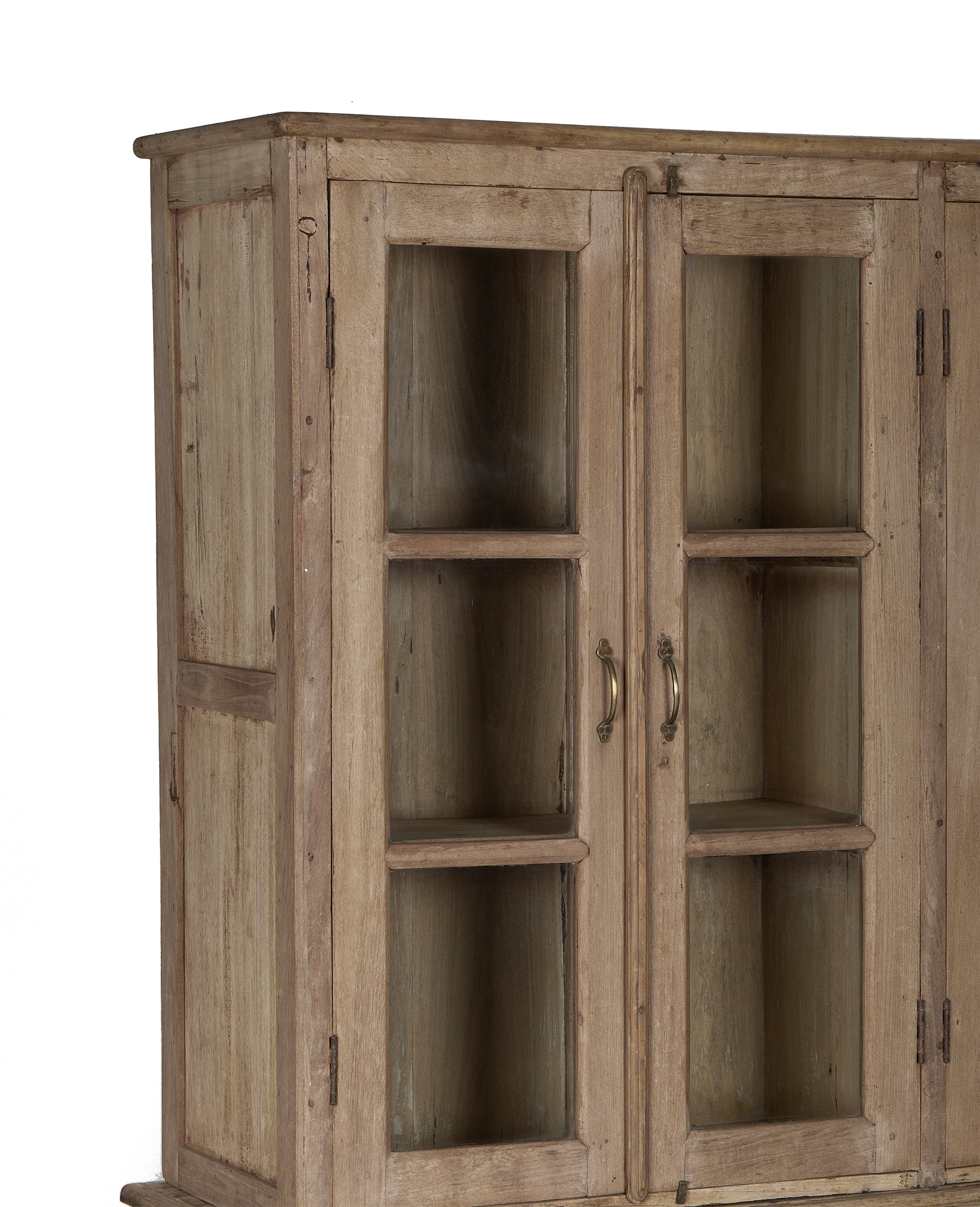 Vintage bleached oak wood cabinet with glass doors and distressed Indian style.