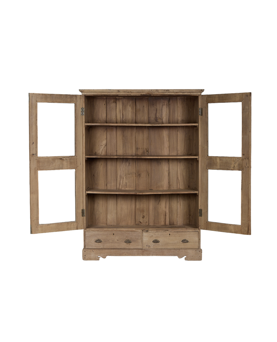 Open-door view of vintage Indian oak wood cabinet, showing interior shelves and drawers.