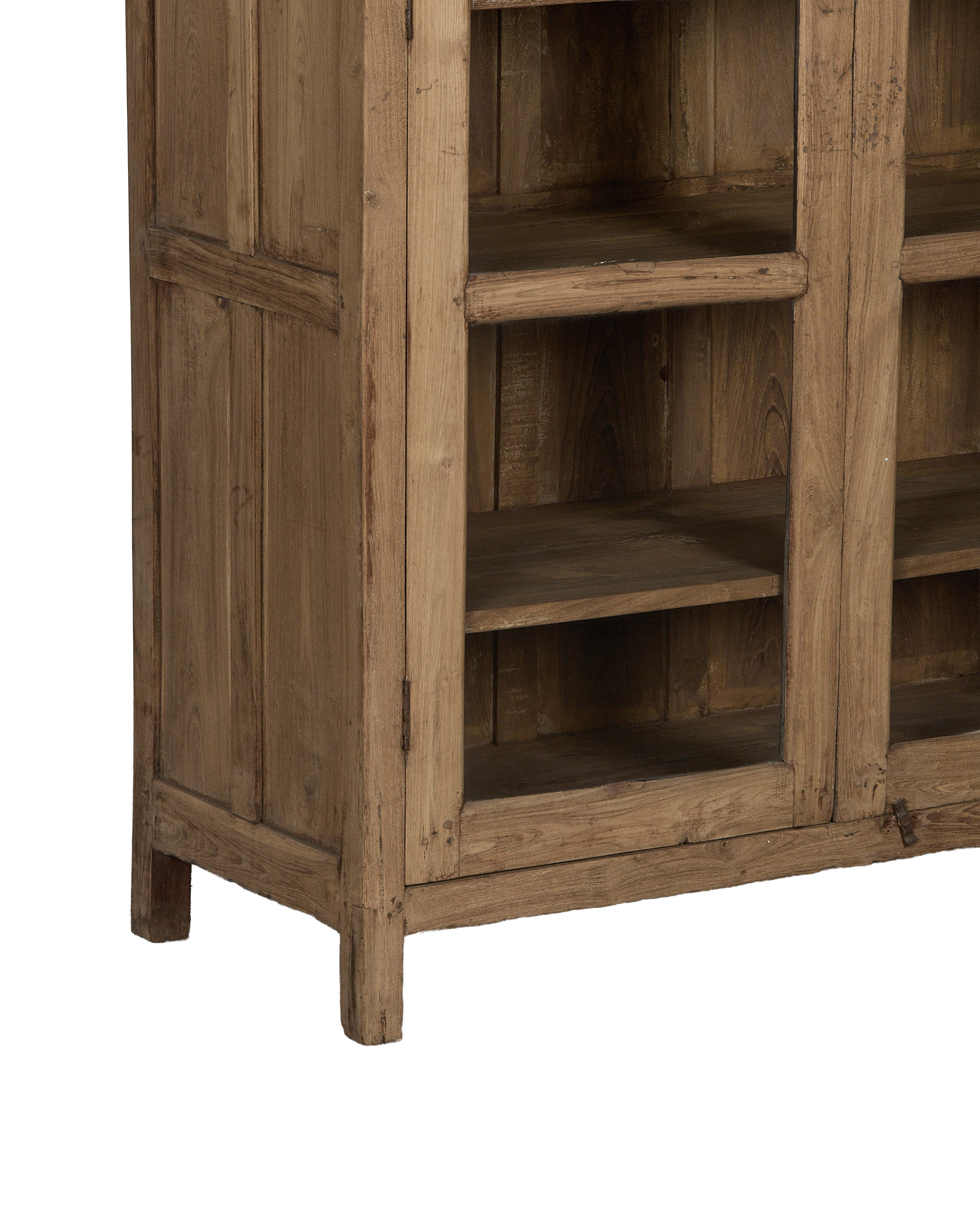 Vintage Indian oak cabinet featuring natural wood grain and rustic metal hinges, close-up.