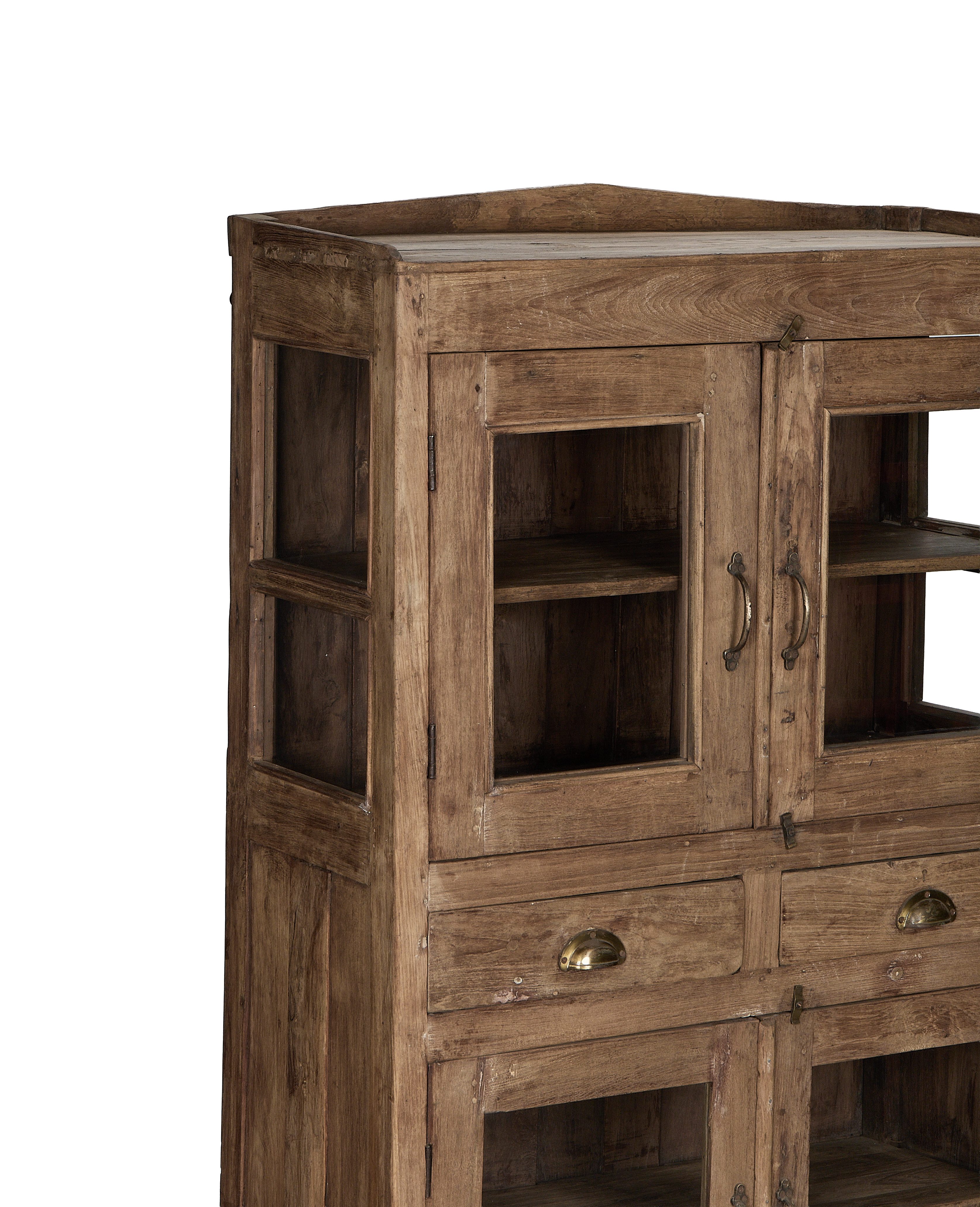 Vintage Indian oak cabinet featuring glass-paneled doors, exposed shelves, and brass hardware detail.