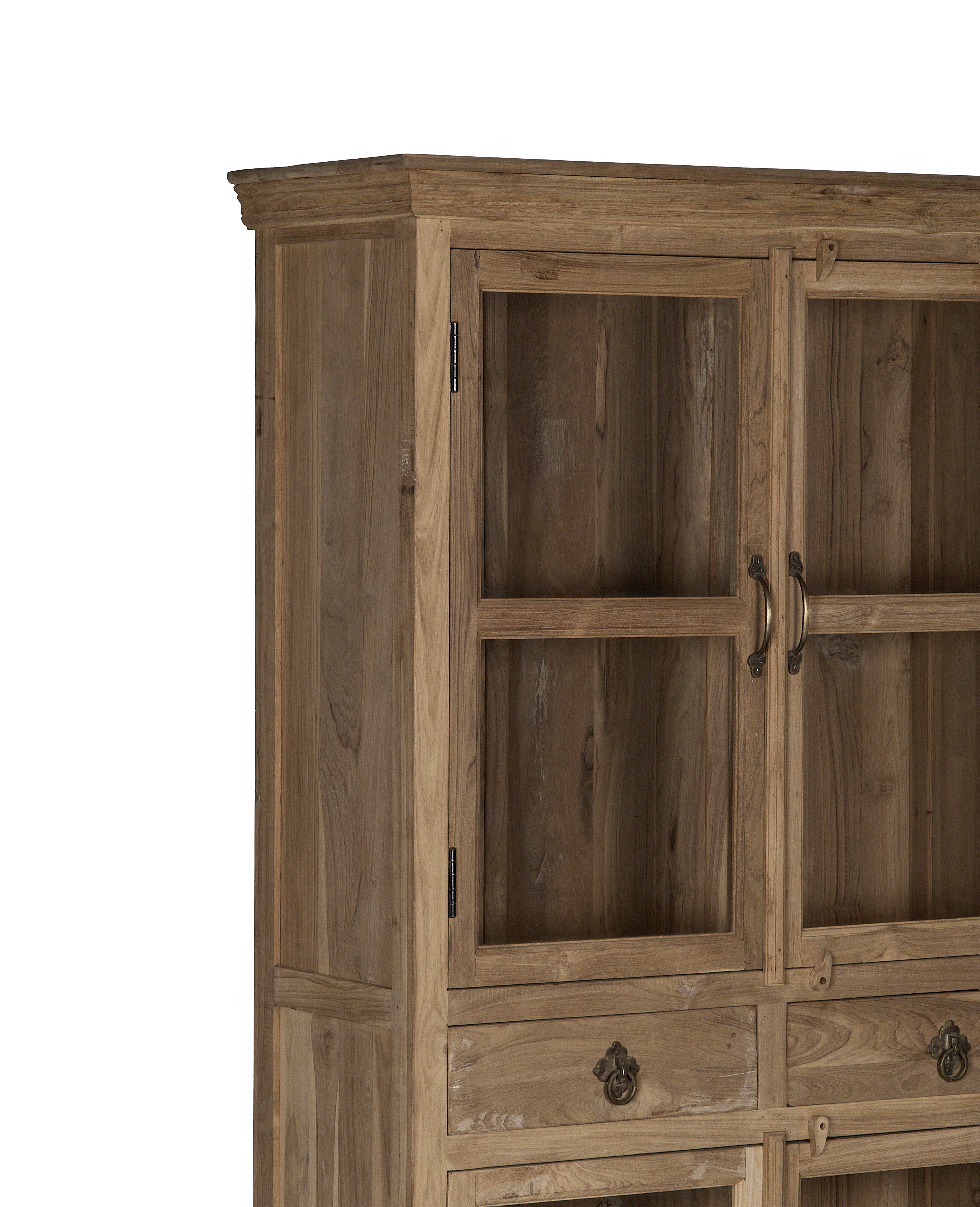 Vintage Indian bleached oak cabinet: close-up of glass doors, antique brass handles, and drawers.