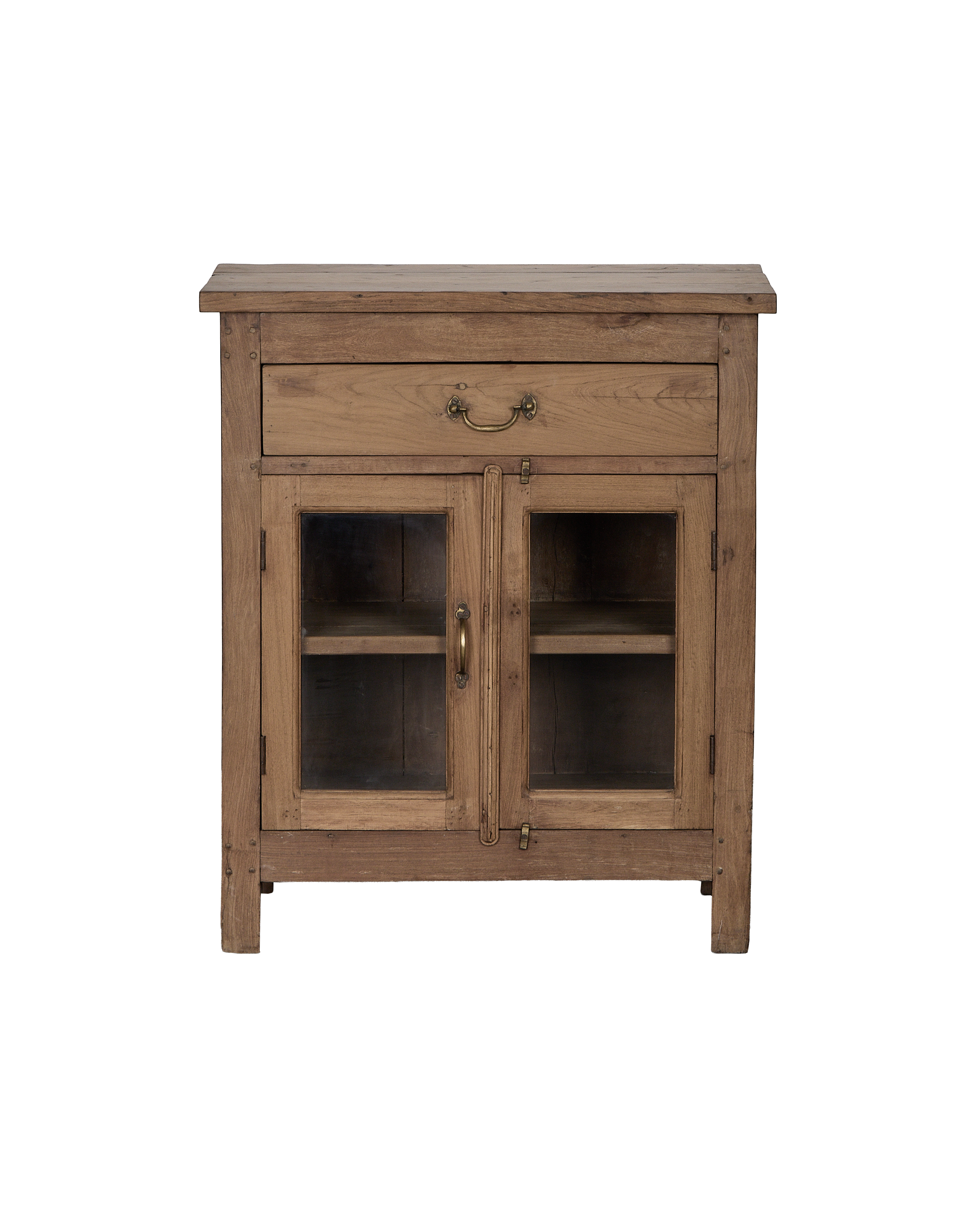 Vintage bleached oak cabinet from India with glass doors, single drawer, and brass pulls.