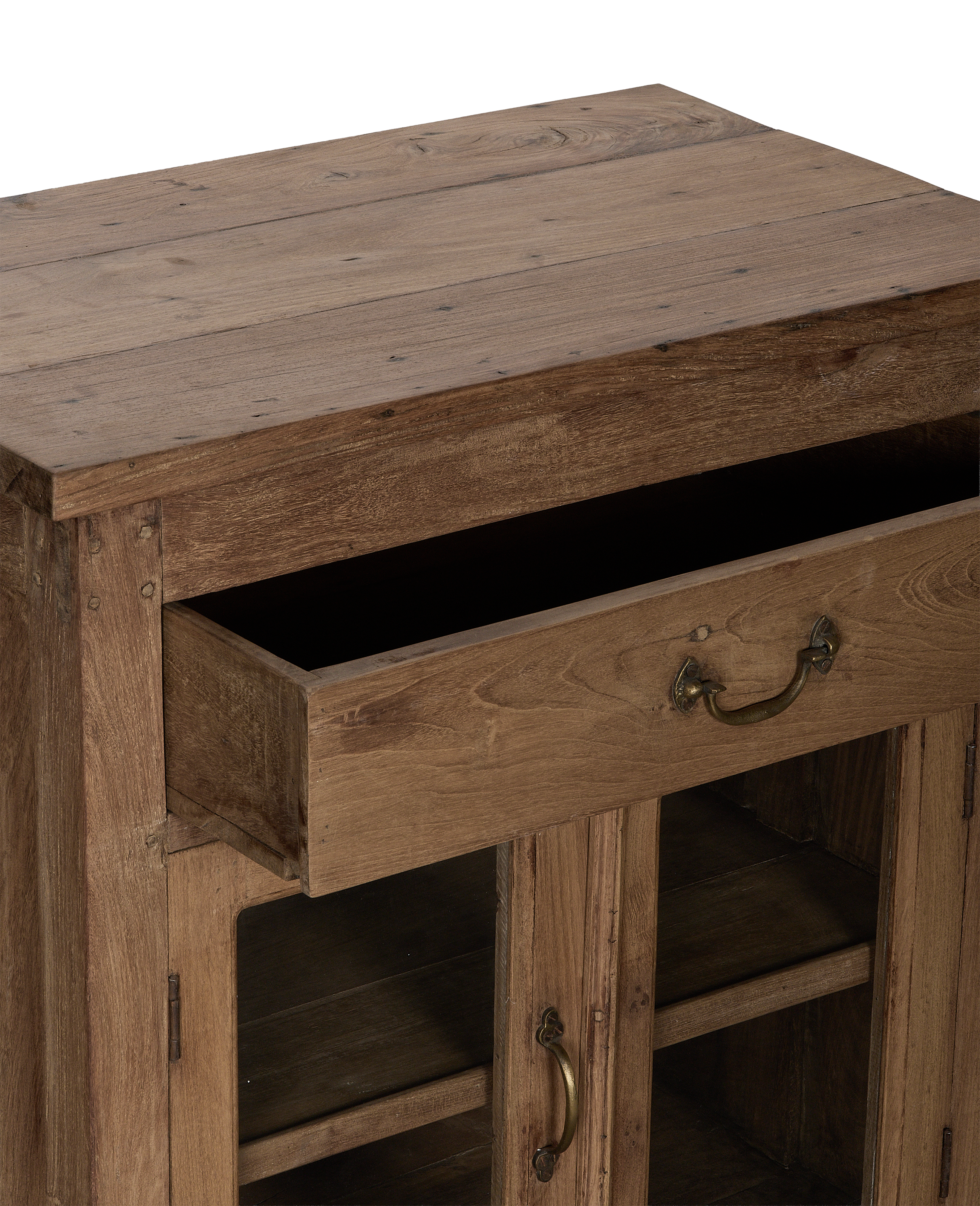 Vintage bleached oak cabinet with open drawer displaying brass hardware, from India.