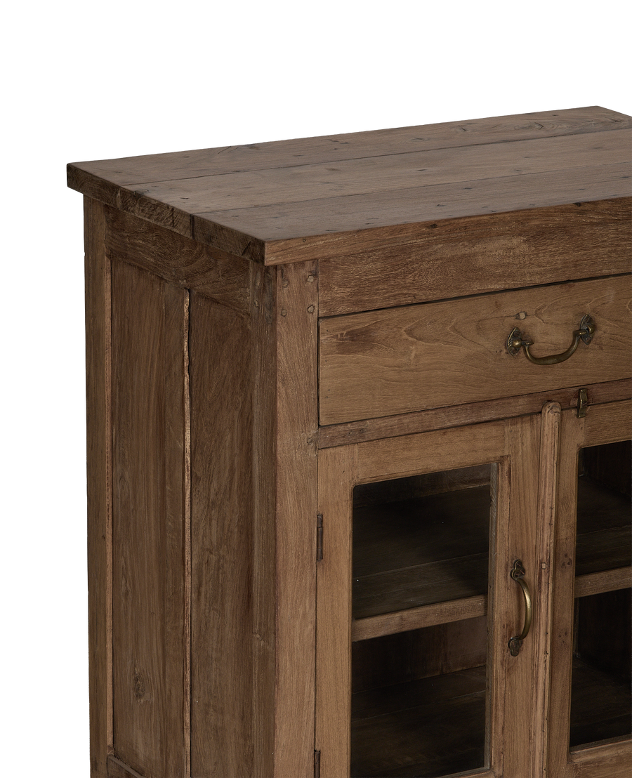 Vintage bleached oak wood cabinet with brass hardware, showing the right side.