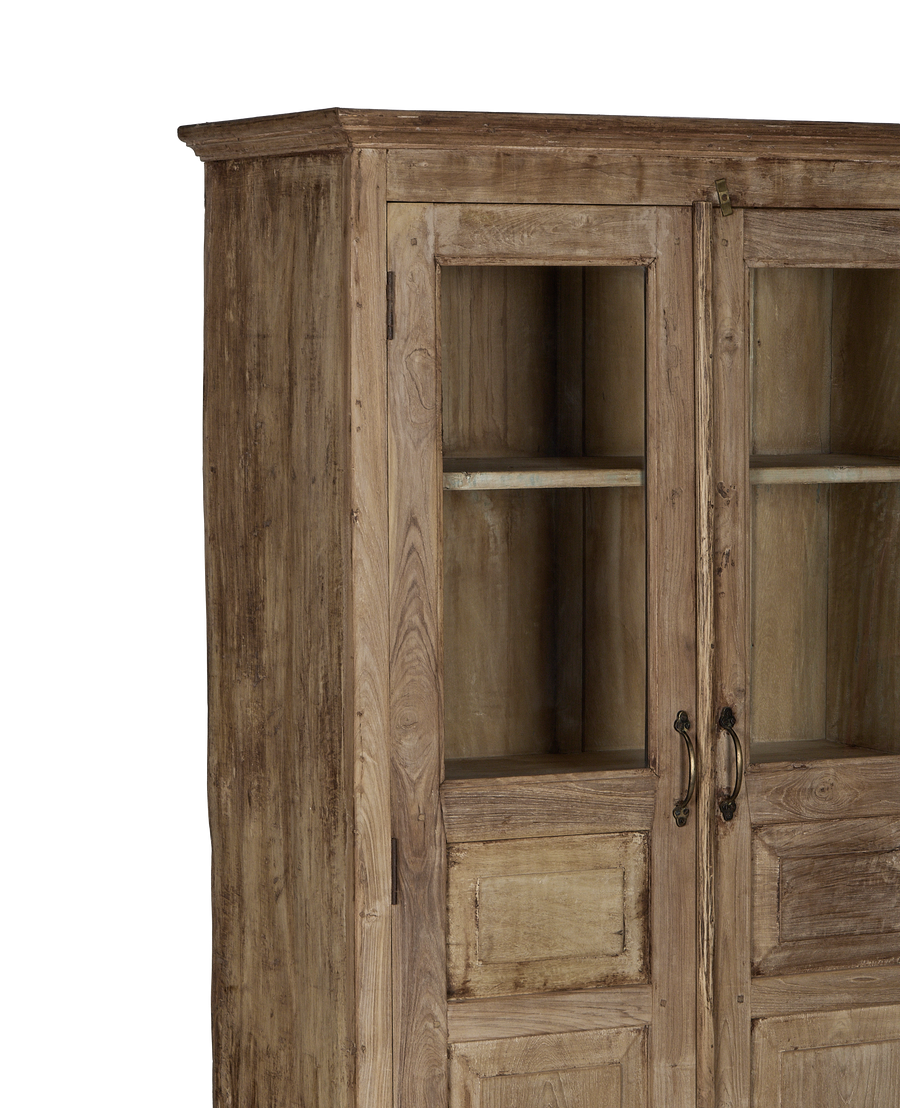 Vintage Indian bleached oak cabinet upper right, showing glass-paned doors and bronze latch.