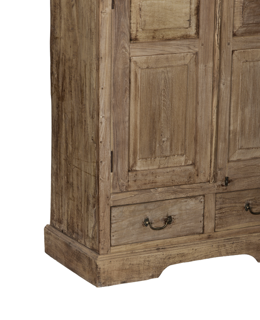 Vintage bleached oak wardrobe from India, close-up of base and right side drawer with ornate pull.