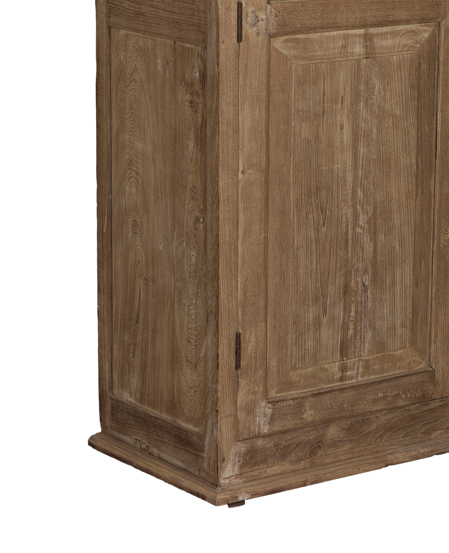 Vintage Indian bleached oak cabinet, showing rustic wood grain, paneling, and base details.