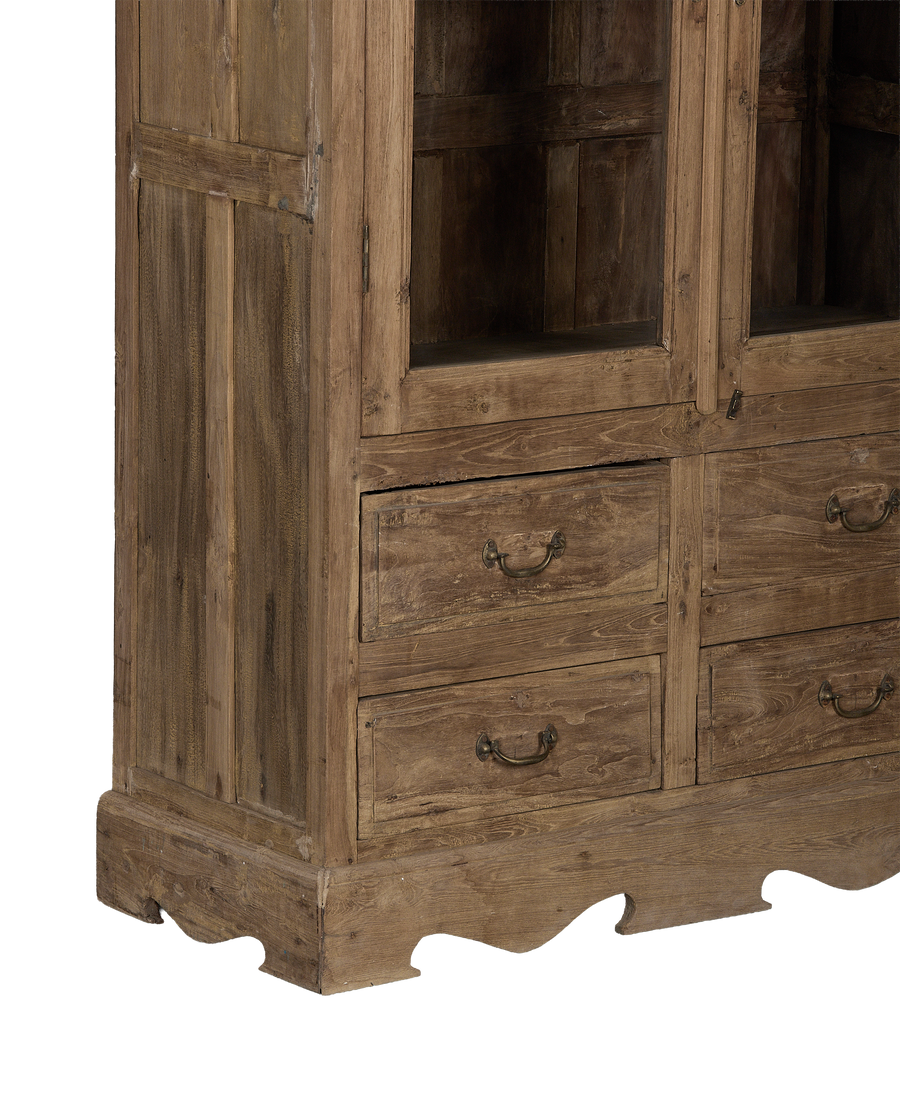 Vintage bleached oak cabinet from India, showcasing ornate carved base details and two lower drawers.