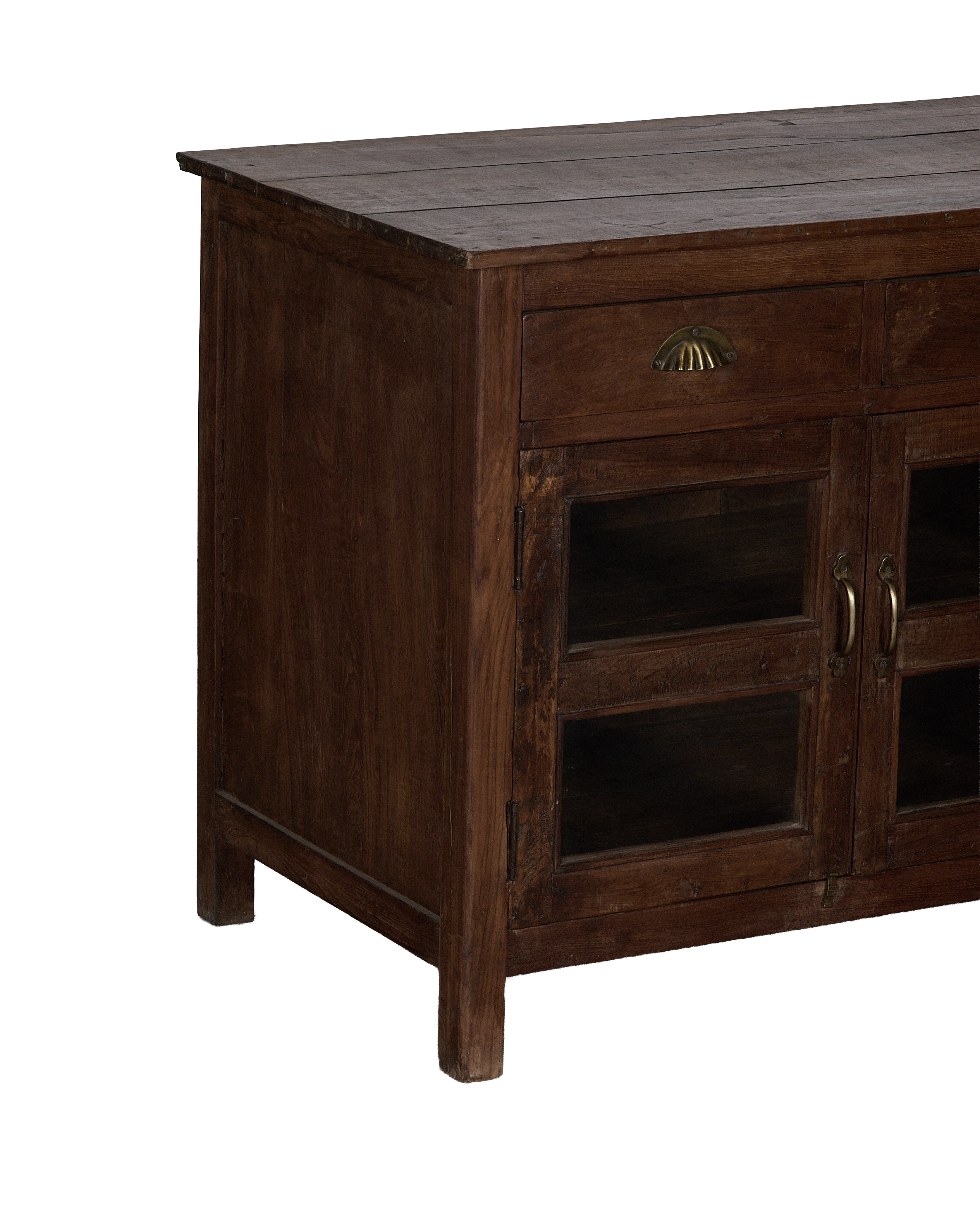 Vintage Indian oak sideboard, angled close-up highlighting drawer with clam-shell pull and glass doors.