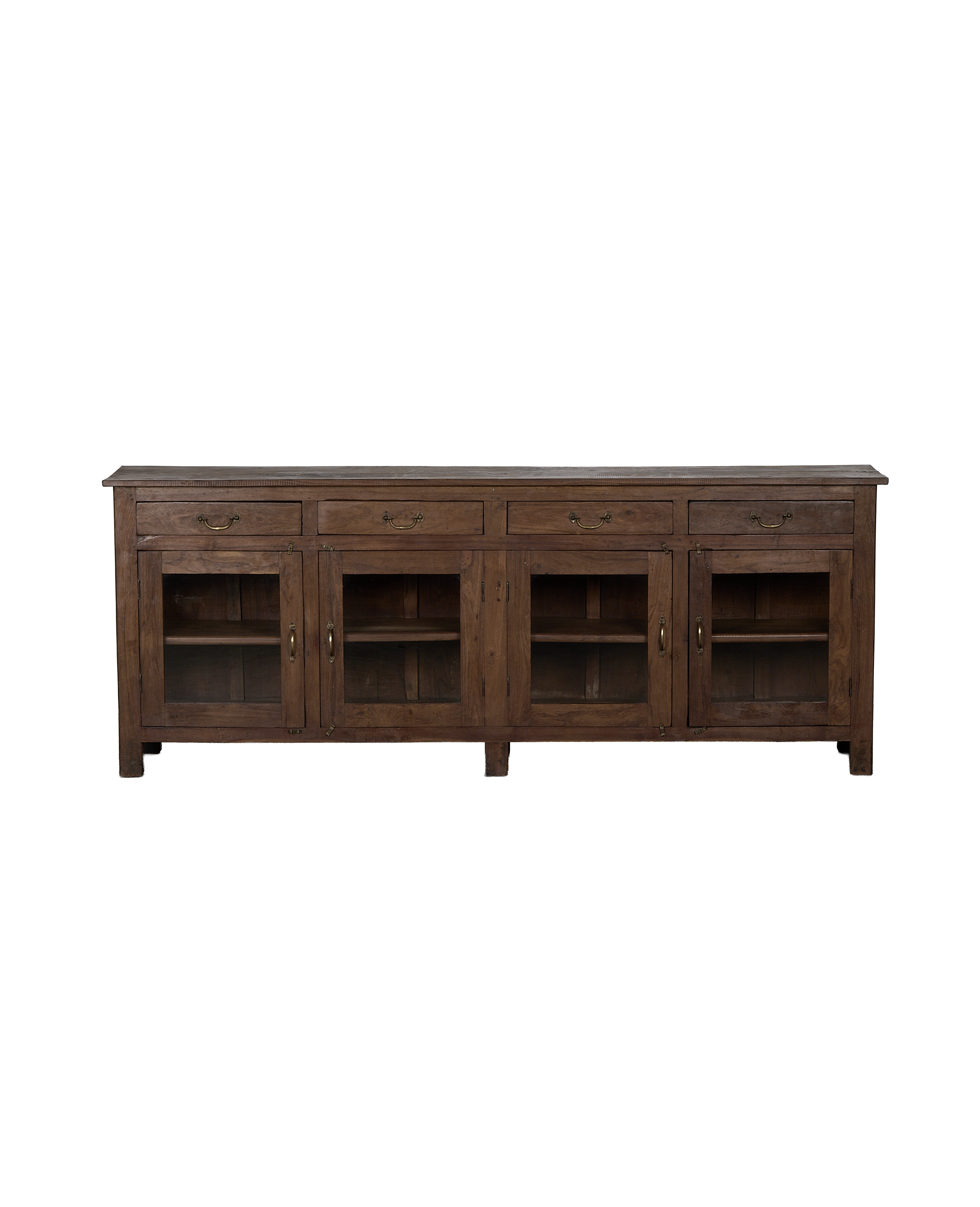 Vintage Indian oak sideboard with four drawers, clear glass doors, and brass pulls.