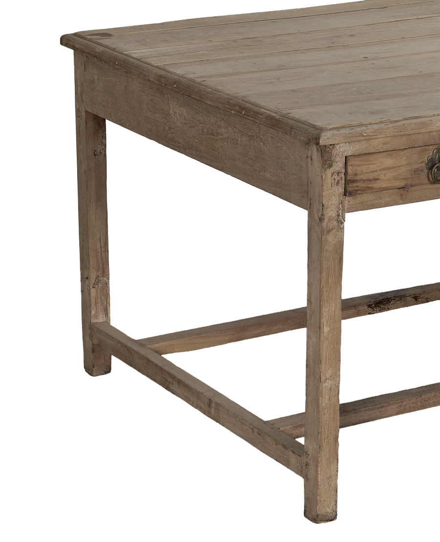Vintage bleached oak desk from India, displaying rustic planked top and drawer detail.