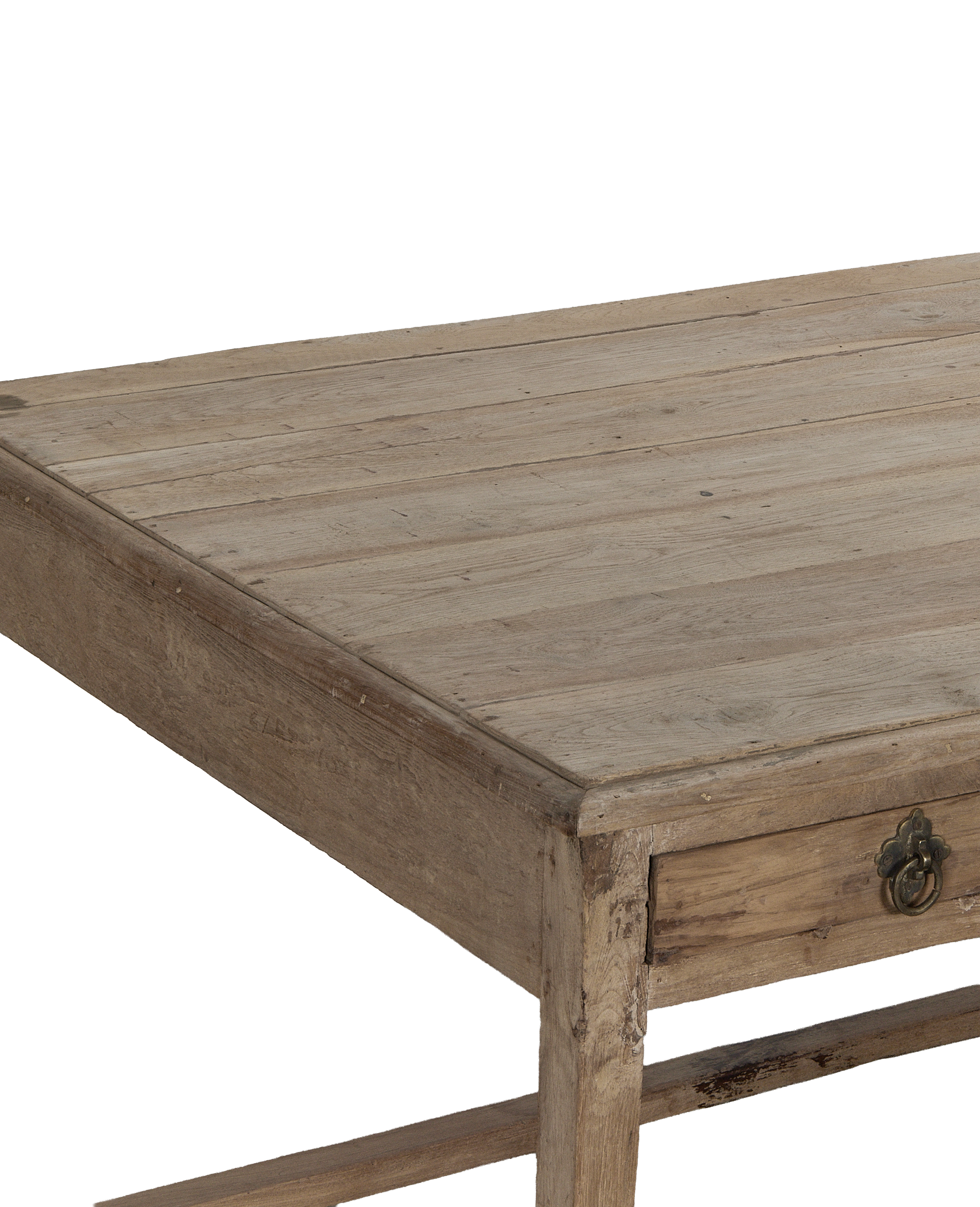 Vintage bleached oak desk, close-up with worn brass drawer pull.