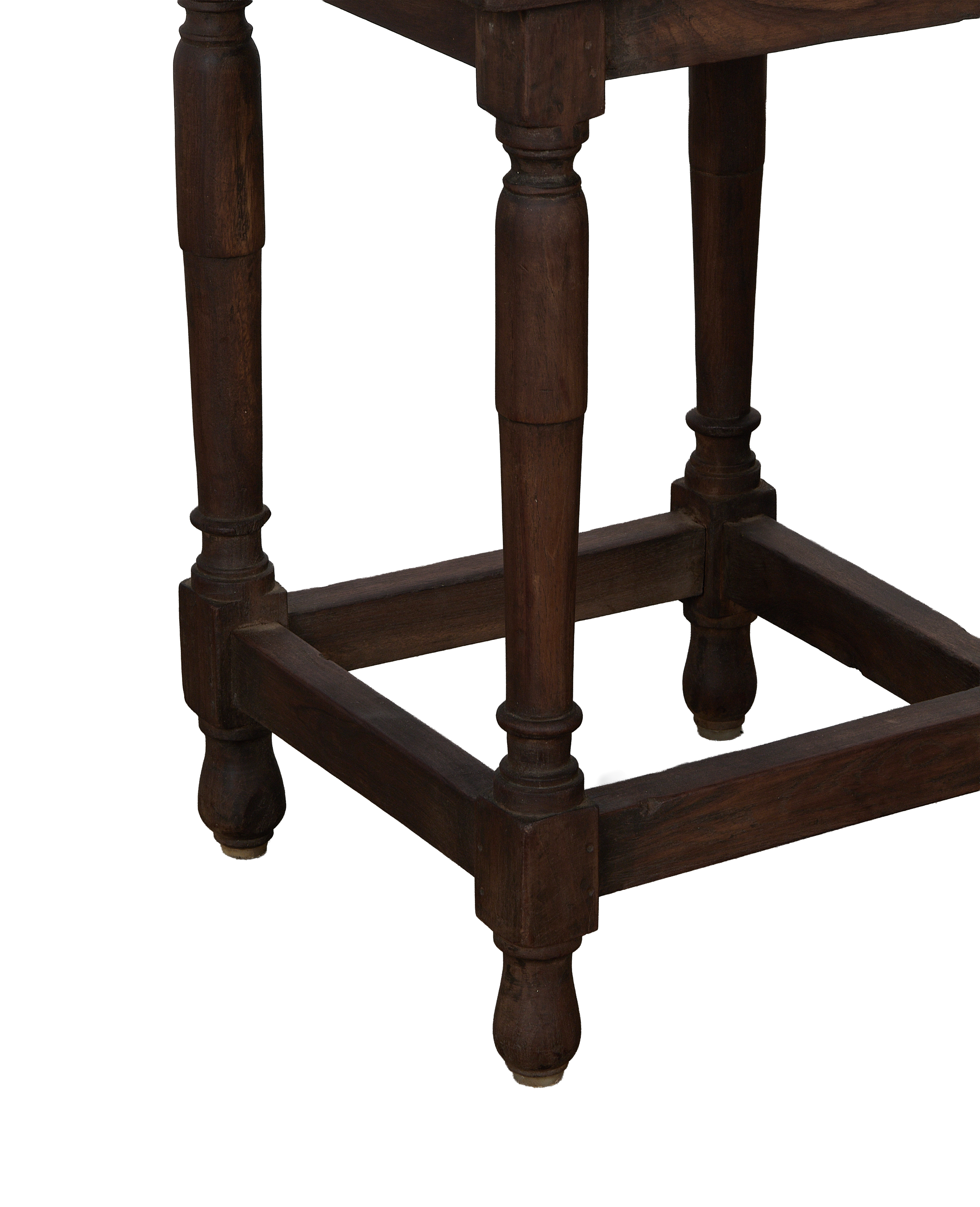 Vintage Indian oak side table showing lower frame with turned legs and foot detail.