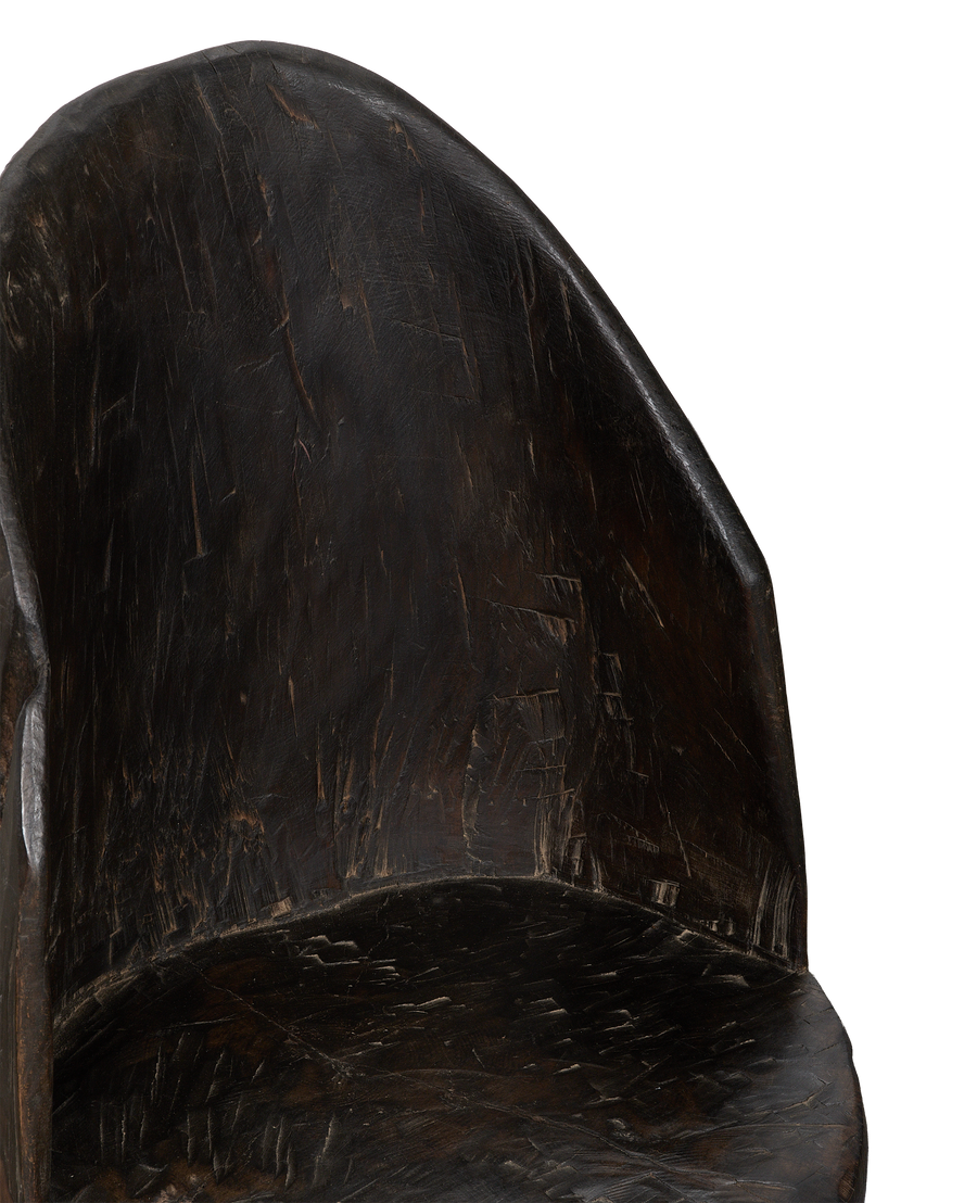 Vintage Nagaland oak chair, close-up of dark wood grain details with worn seat.