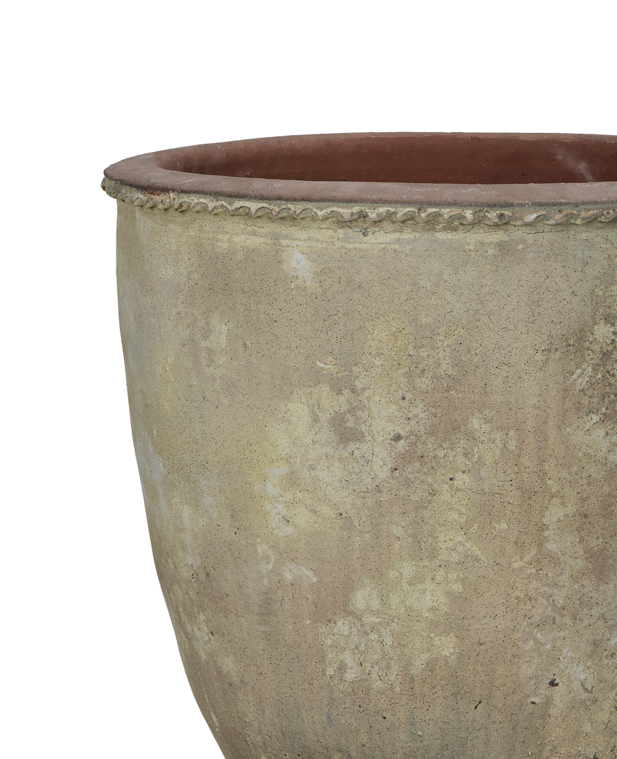 Close-up of vintage Vietnamese terrace planter rim, showing beautiful intricate detail and textured stoneware.