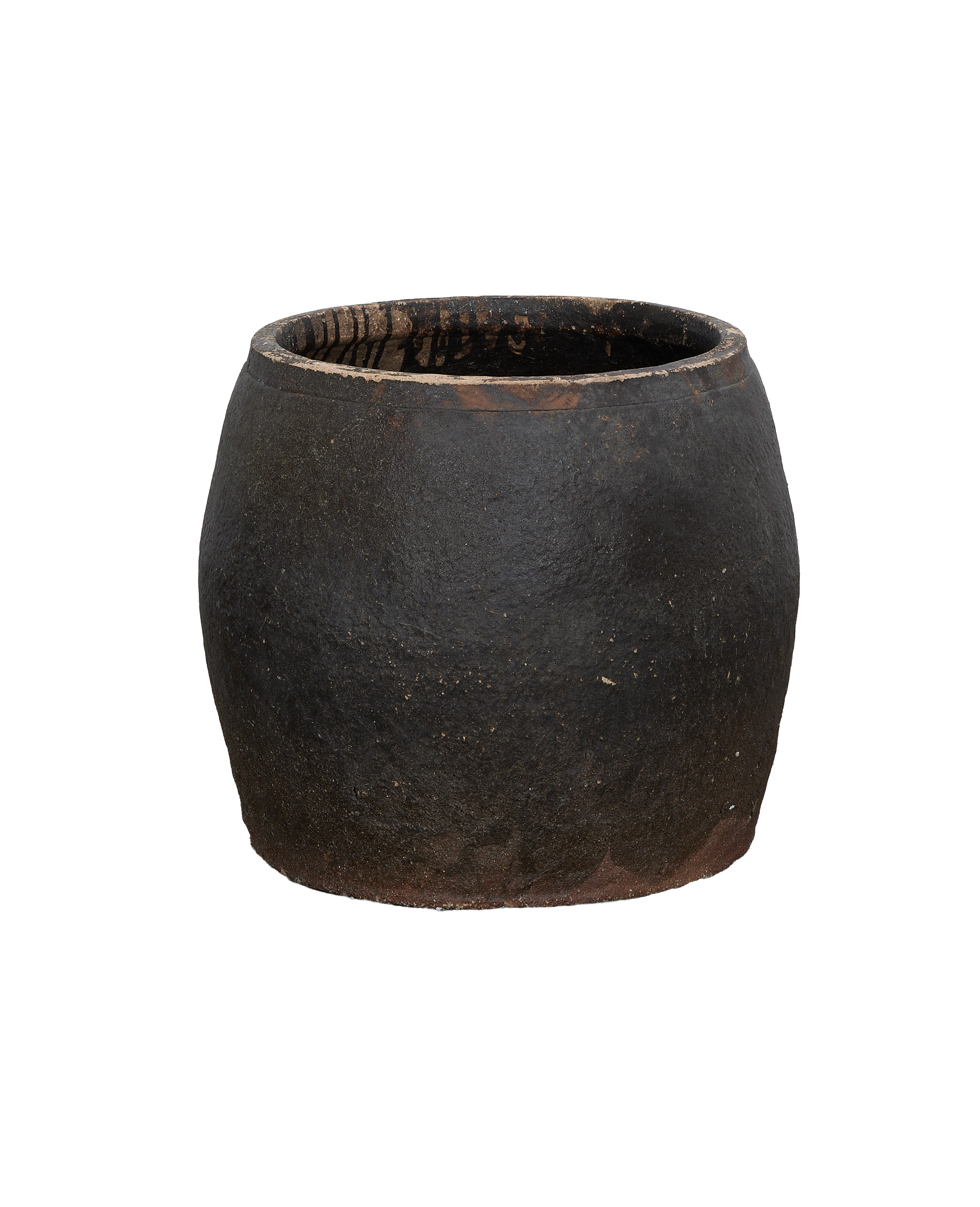 Vintage black ceramic persimmon planter, top rim and interior showing aged texture.