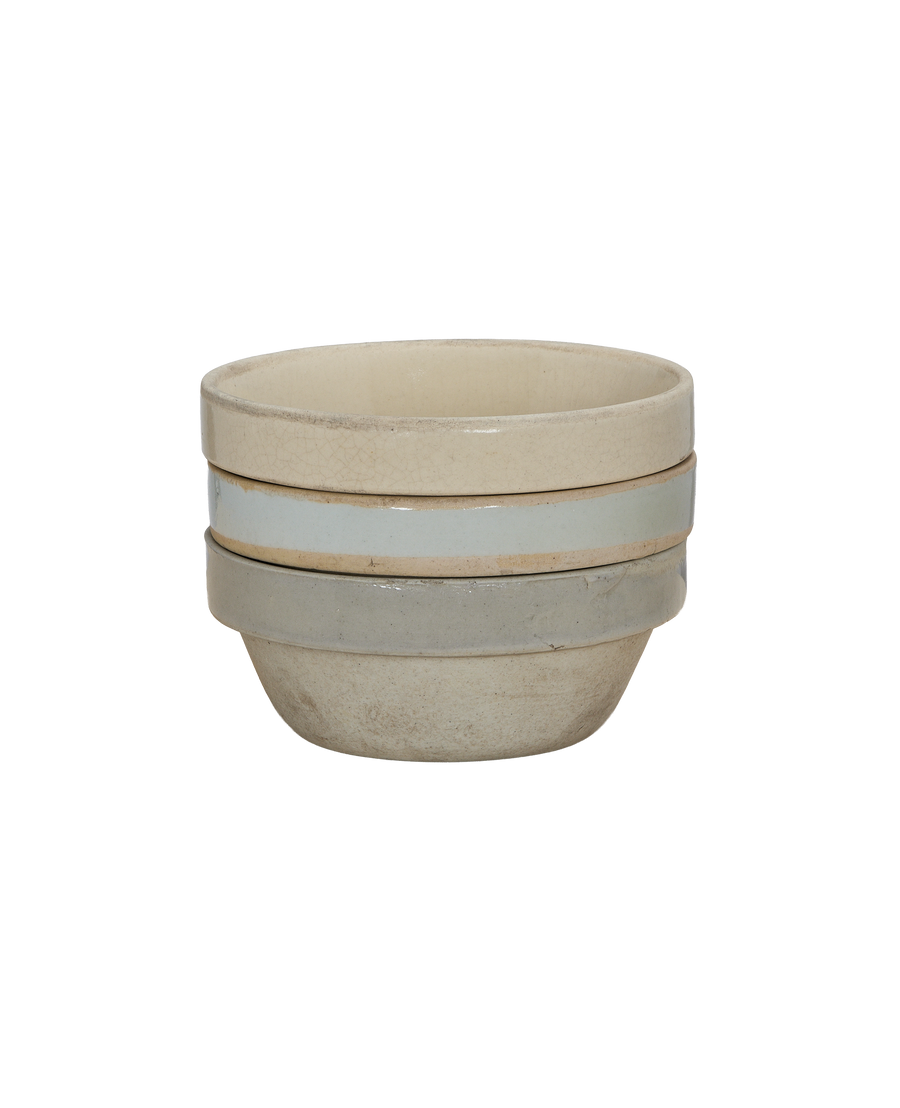 Stacked vintage Jasmine bowls, three pieces, showing various aged ceramic glazes and crackling.