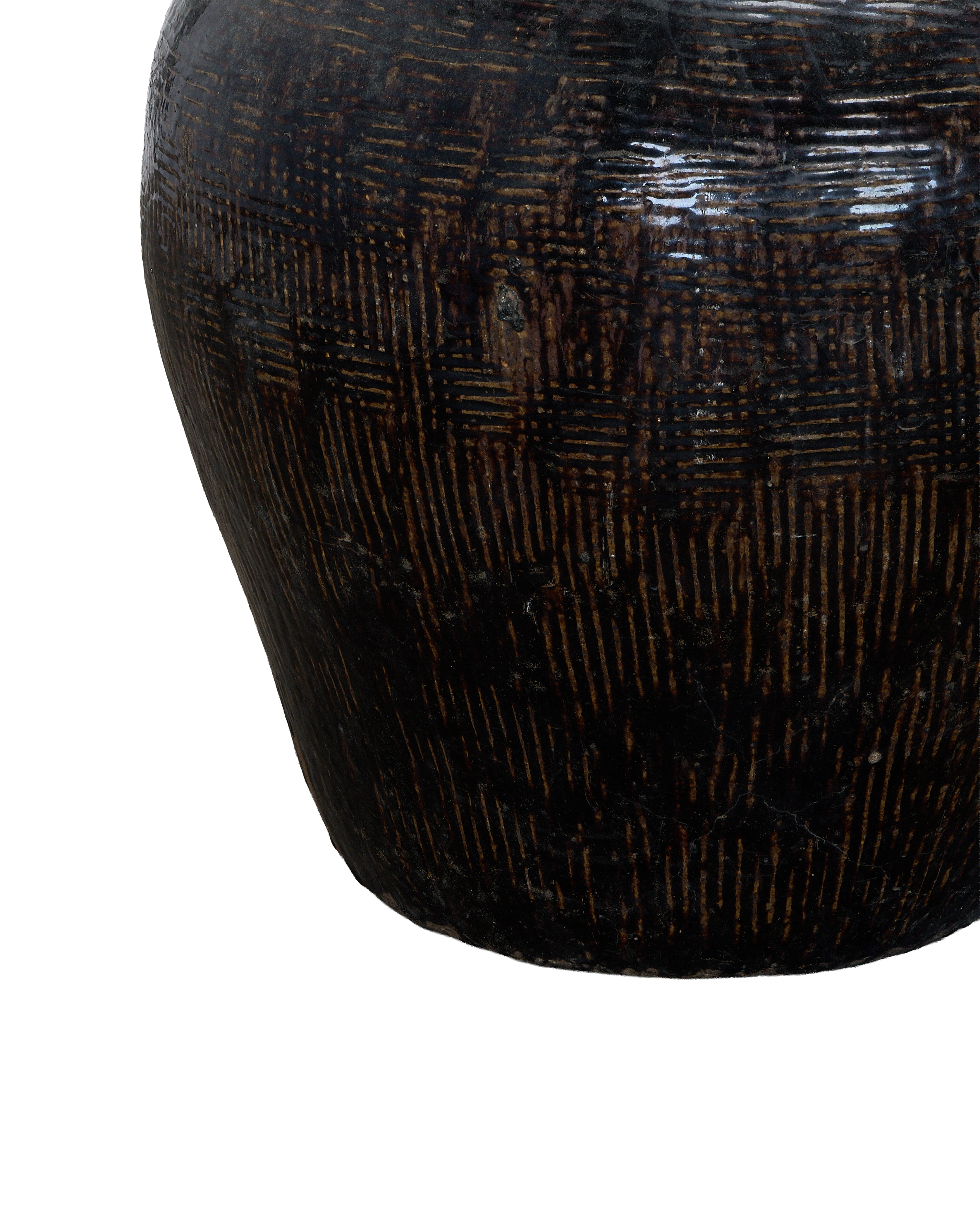 Close-up of vintage Chinese ceramic jar with textured, weathered dark brown glaze.