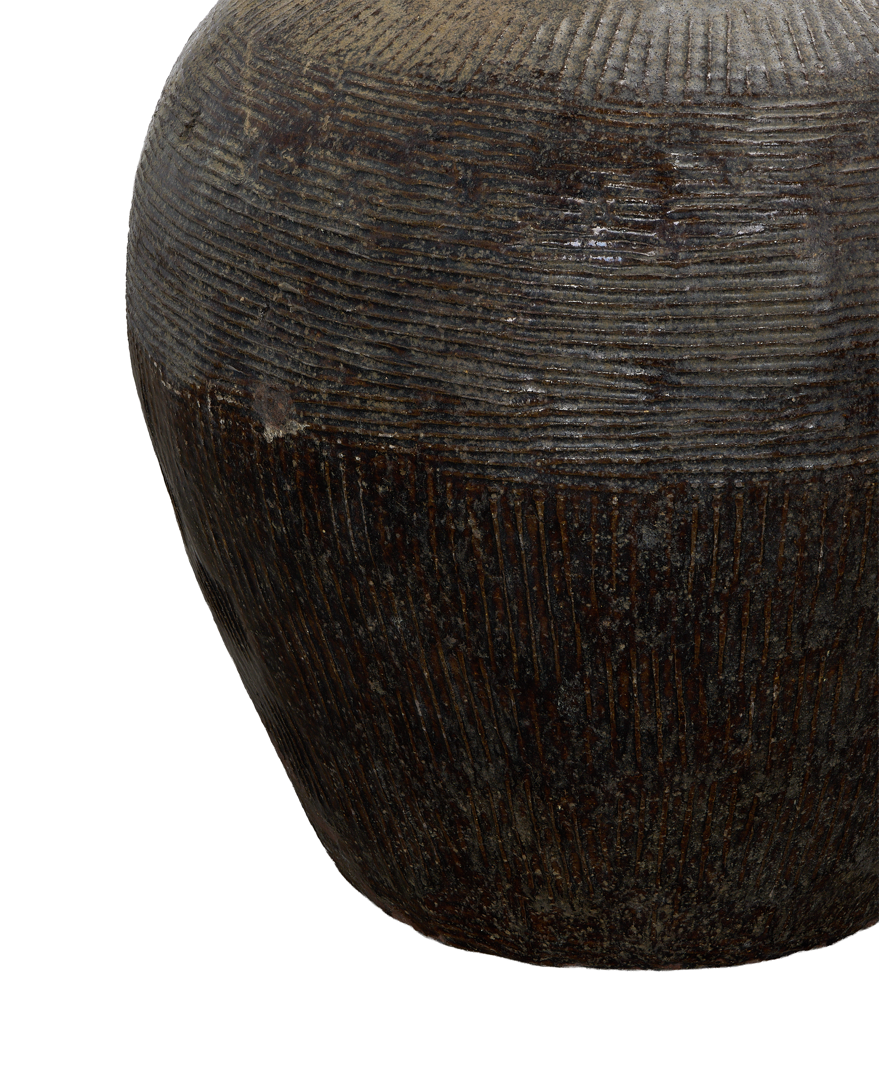 Close-up of vintage Chinese Willow Jar's rough, textured surface and dark glaze.