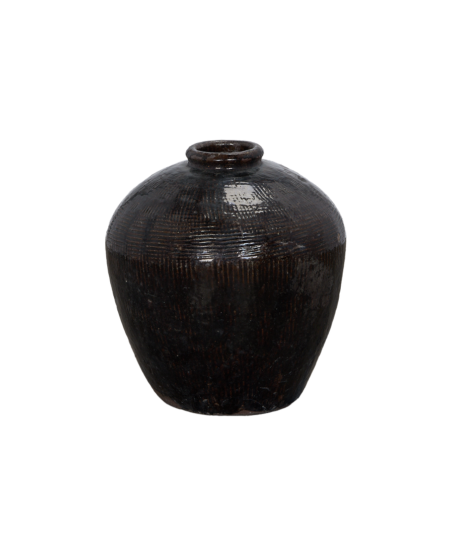 Vintage Chinese black willow jar with textured pattern, close-up top view.
