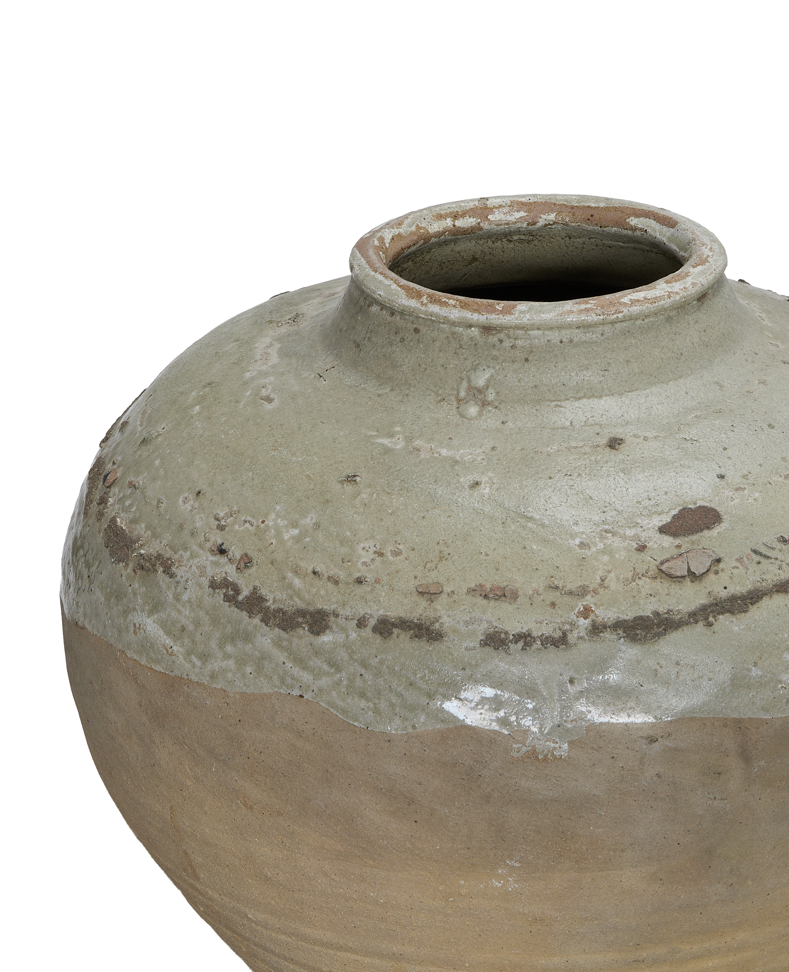 Vintage Chinese amber jar, close-up of textured rim and two-tone glaze.
