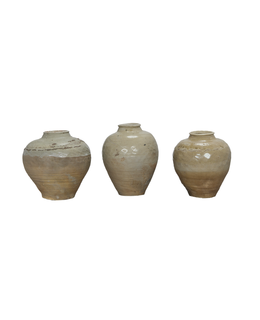 Three vintage Chinese stoneware bulk amber jars, showcasing varied antique white glazes and rustic textures.