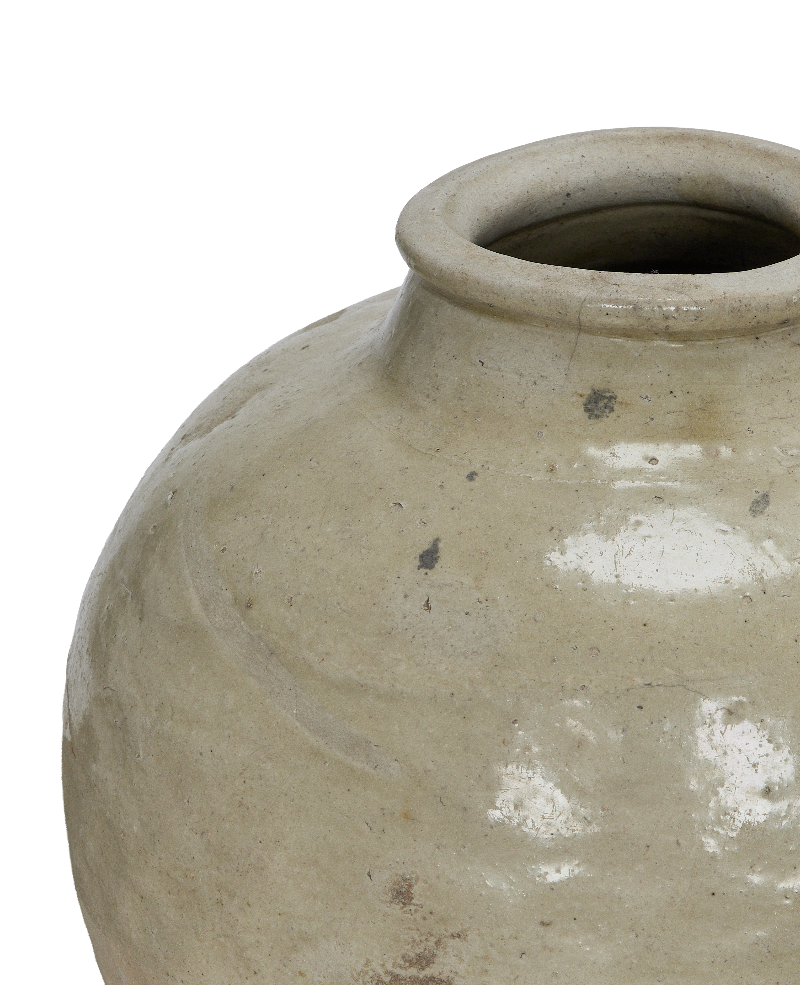 Vintage Chinese amber ceramic jar, showing unique detailed rim and weathered surface texture.