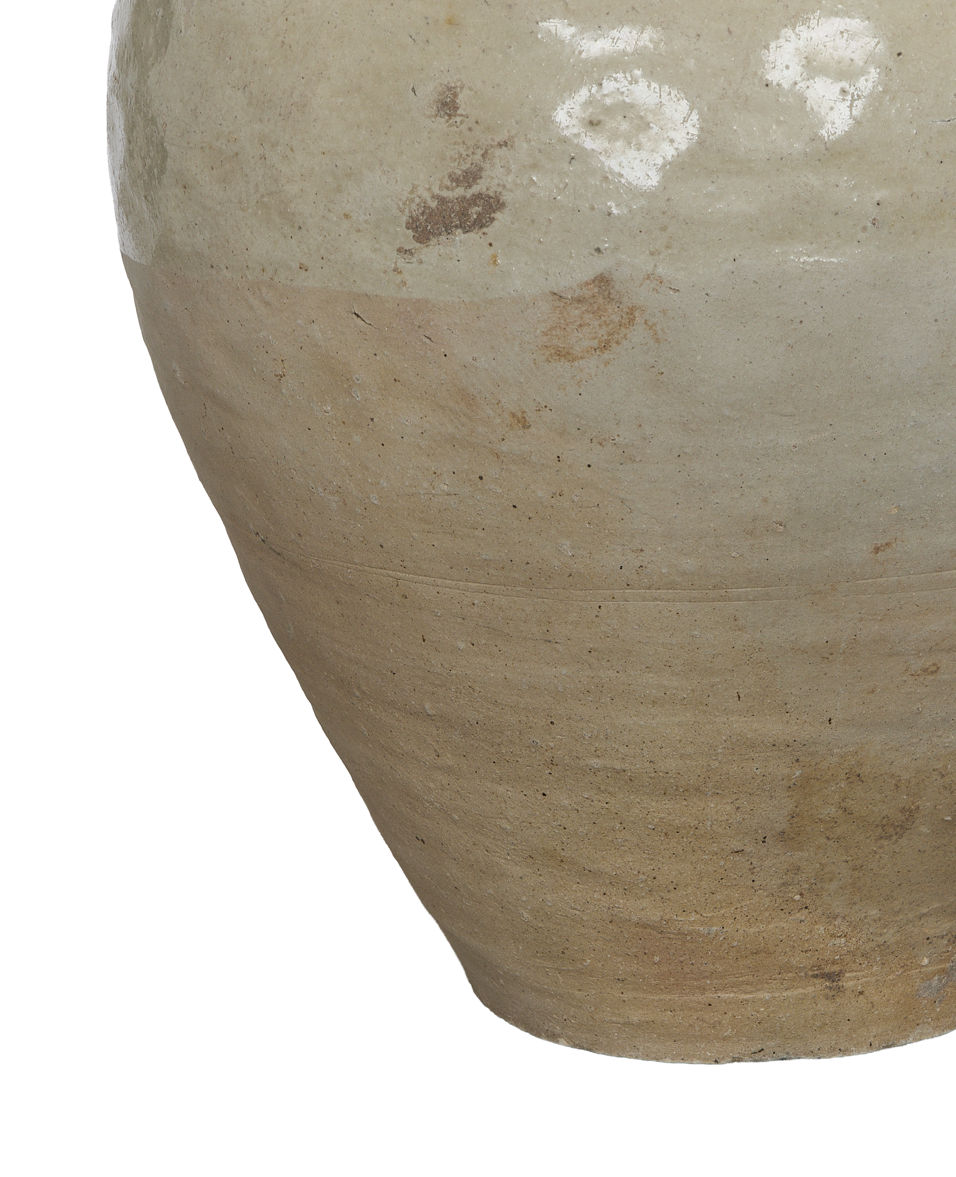 Close-up of vintage Amber Jar's textured, weathered ceramic surface with light glaze.
