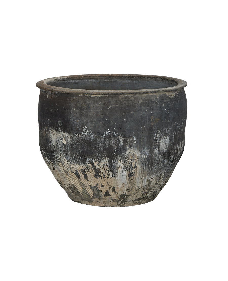 Vintage Chinese ceramic water planter, showing weathered black exterior with textured white and tan peeling.