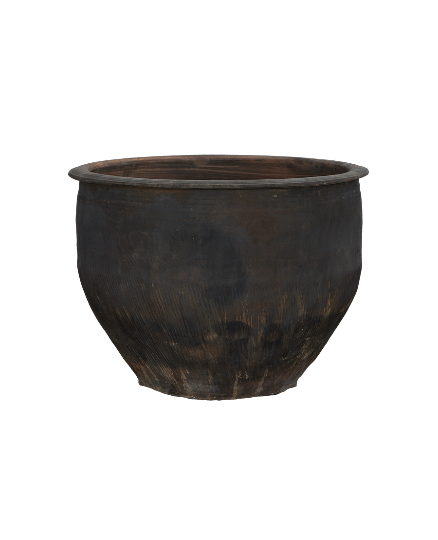 Vintage Chinese oak water planter, dark patina, showing textured surface details up close.