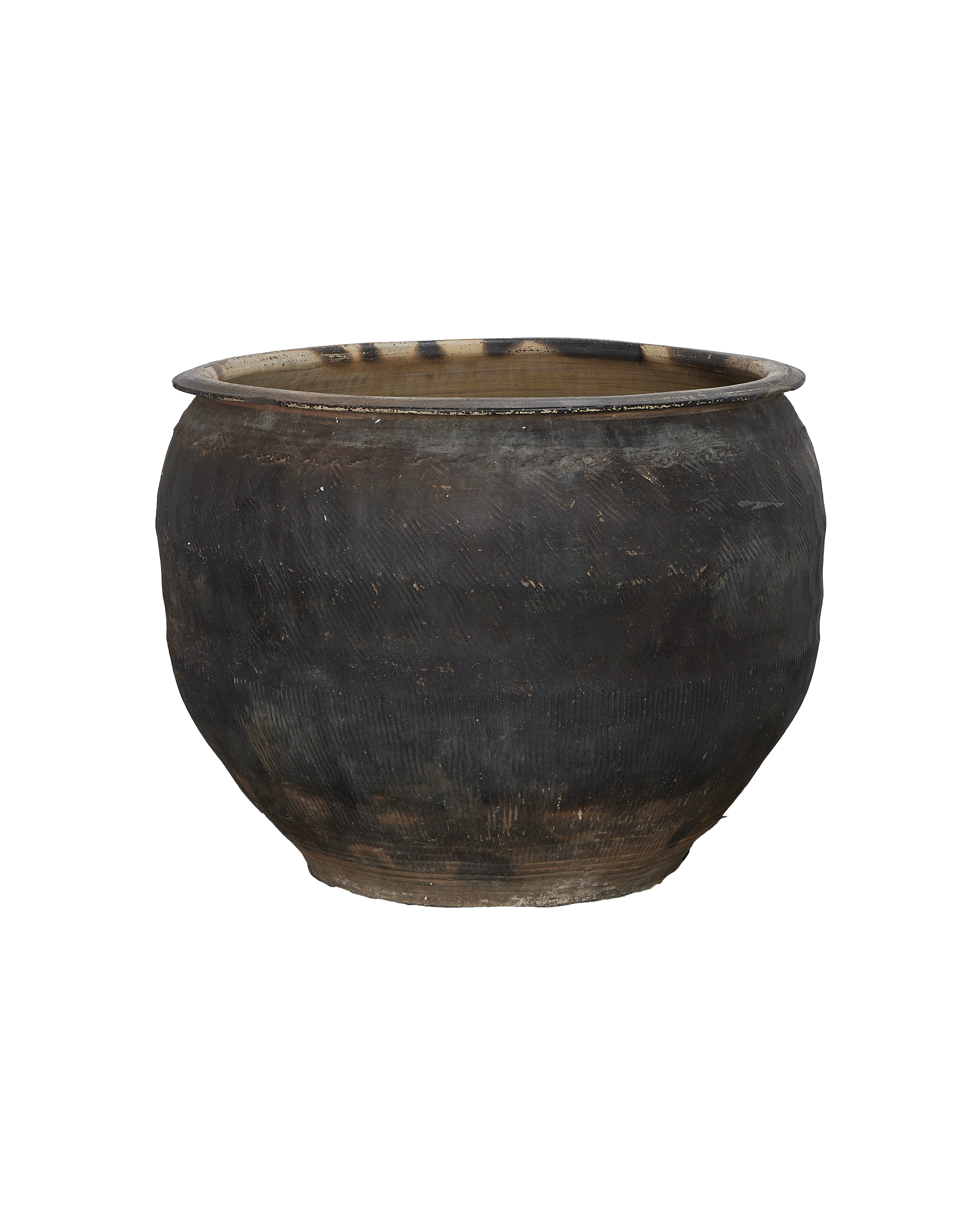 Vintage Chinese water planter. Dark oak vessel, wide mouth, detailed textured surface.