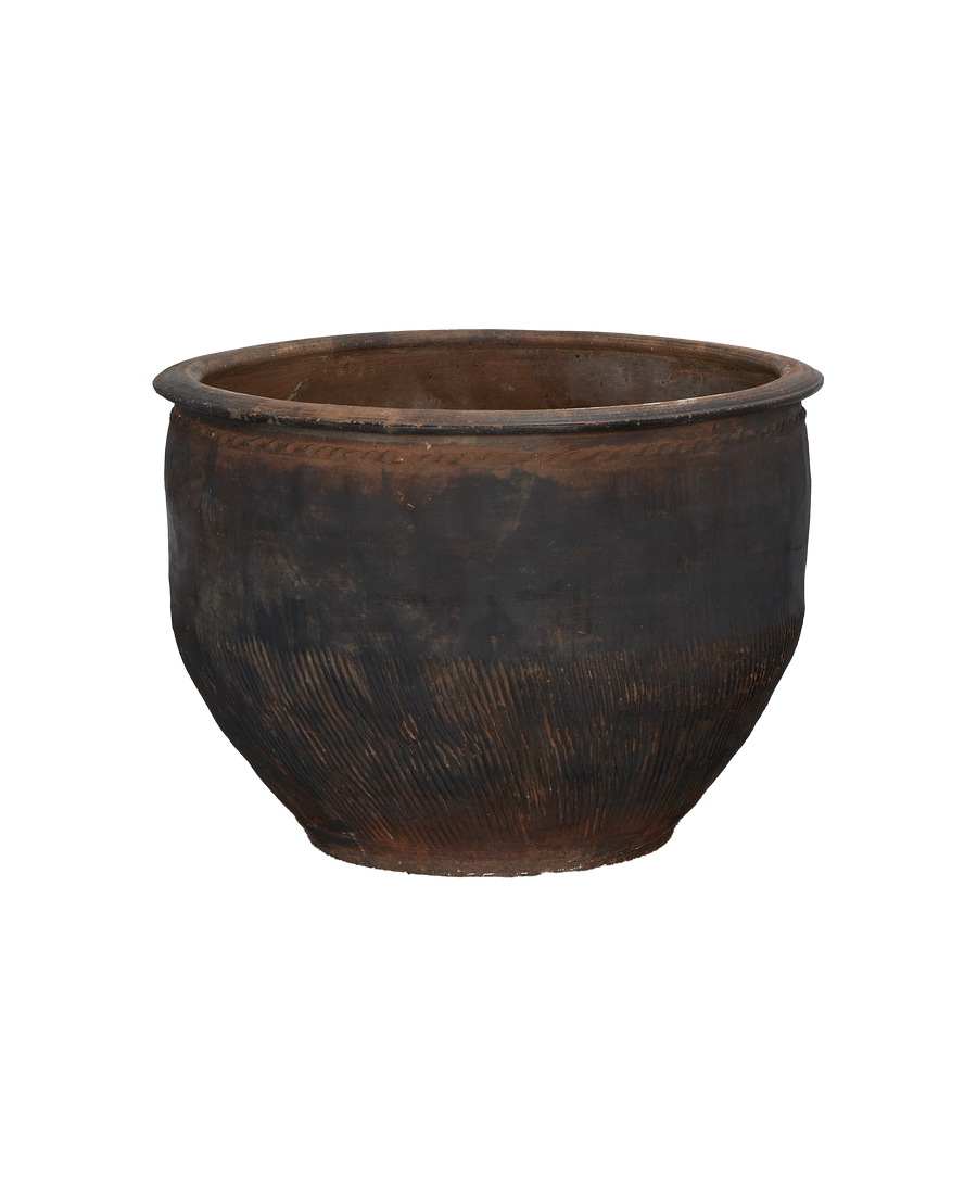 Vintage Chinese oak water planter with textured dark wood finish and natural wear.
