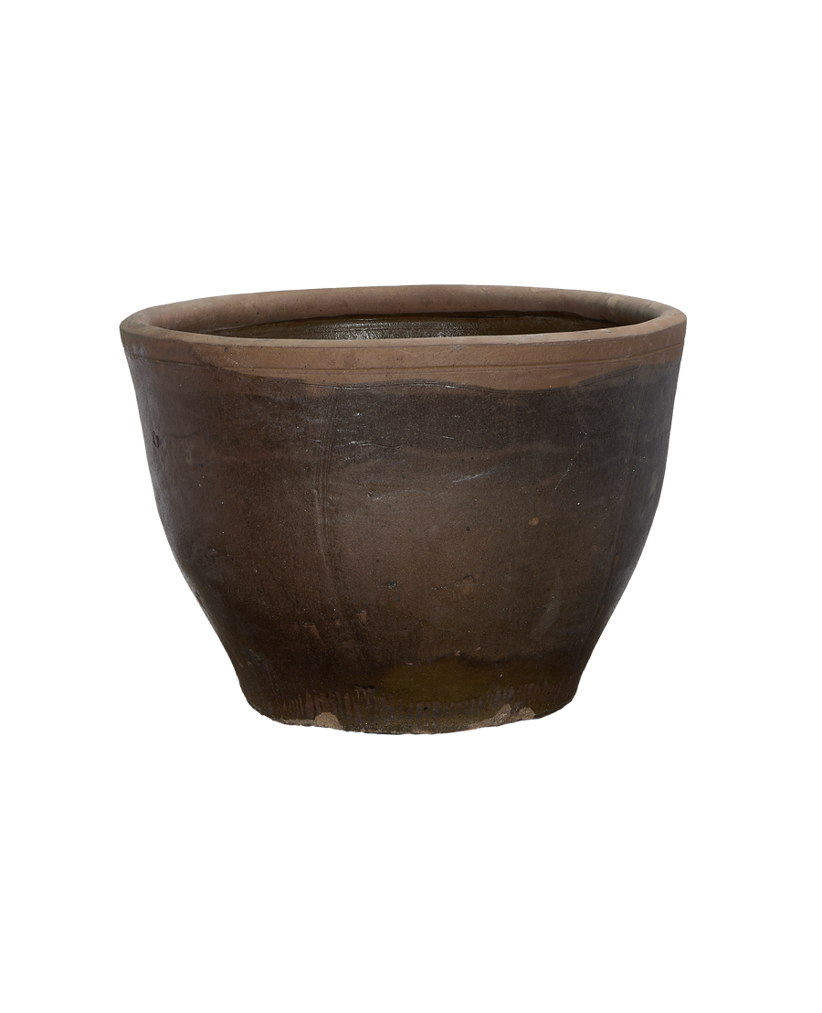 Vintage Chinese terracotta planter, detailed view of textured brown exterior and weathered rim.