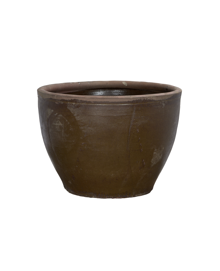 Vintage Chinese mulberry oak planter, showing its worn, textured exterior and interior rim.