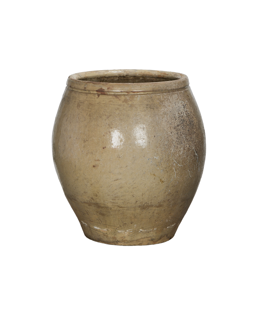 Vintage Chinese ceramic plum planter, close up of aged oak-colored surface, showing textured patina.