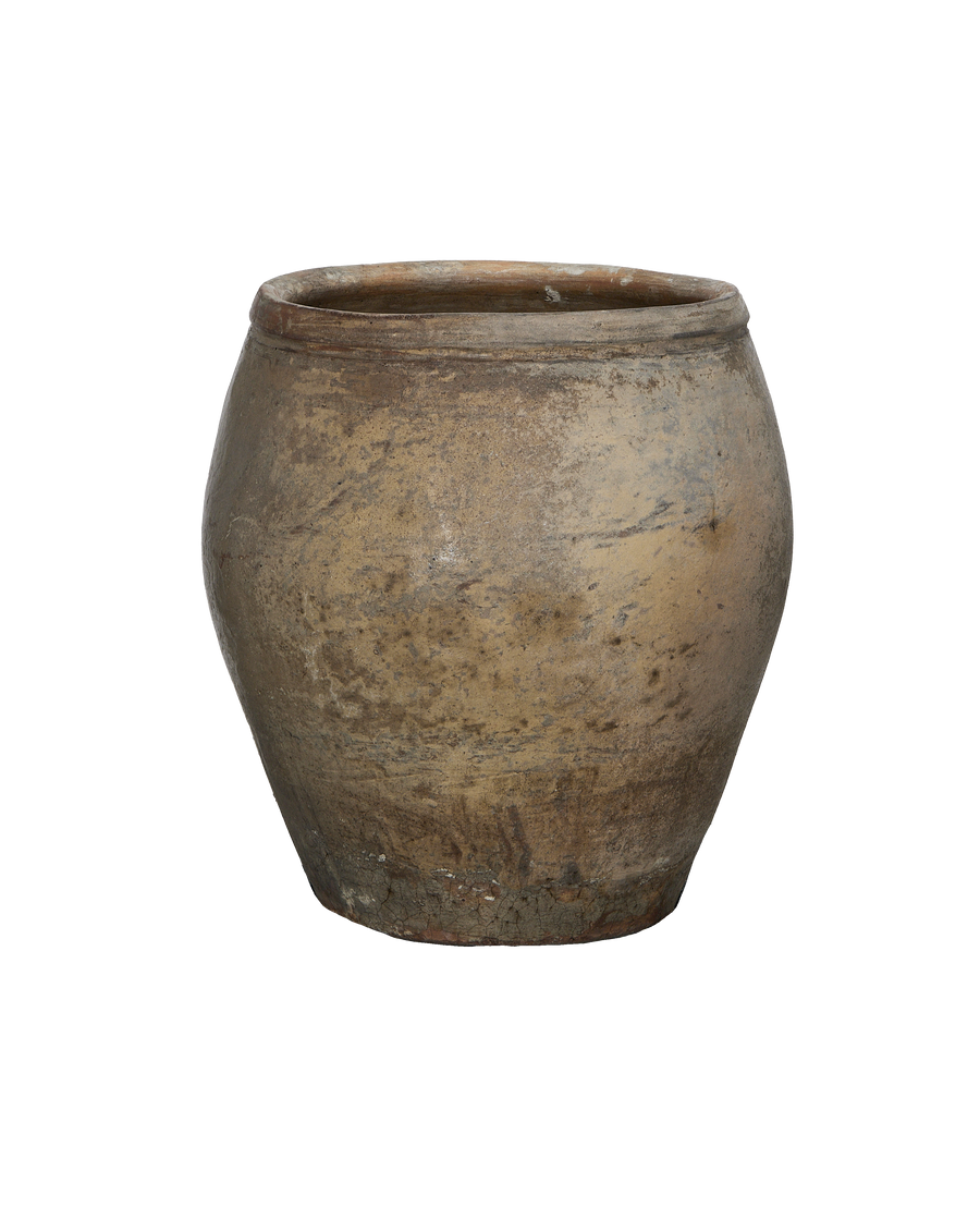 Vintage Chinese ceramic plum planter, close up of distressed, unglazed surface texture.