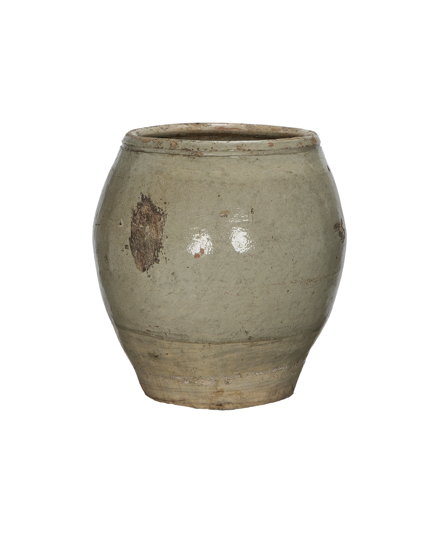 Vintage Chinese ceramic plum planter, distressed glaze detail showing wear and texture.