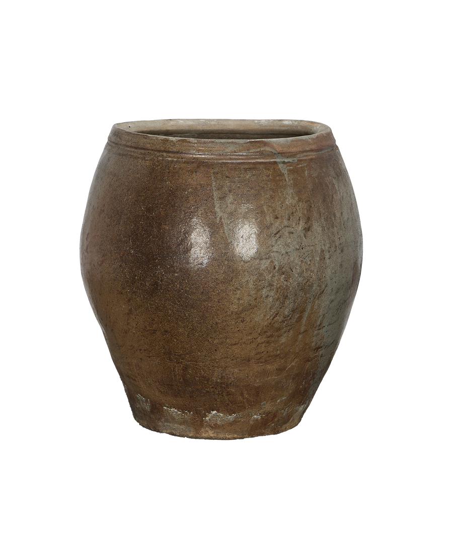 Vintage Chinese ceramic plum planter, showing textured, weathered surface and rim details.
