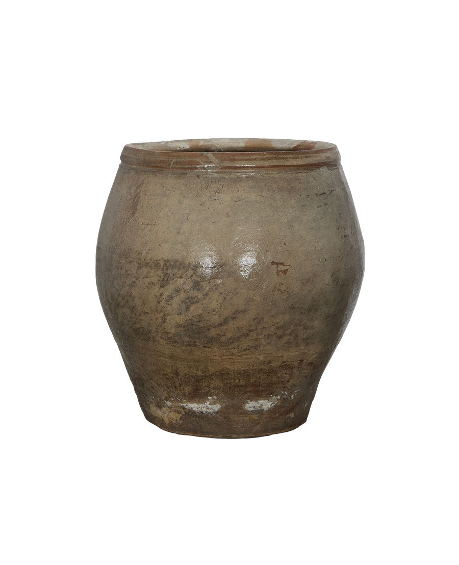 Vintage Chinese ceramic plum planter, showing textured, weathered surface and rim details.